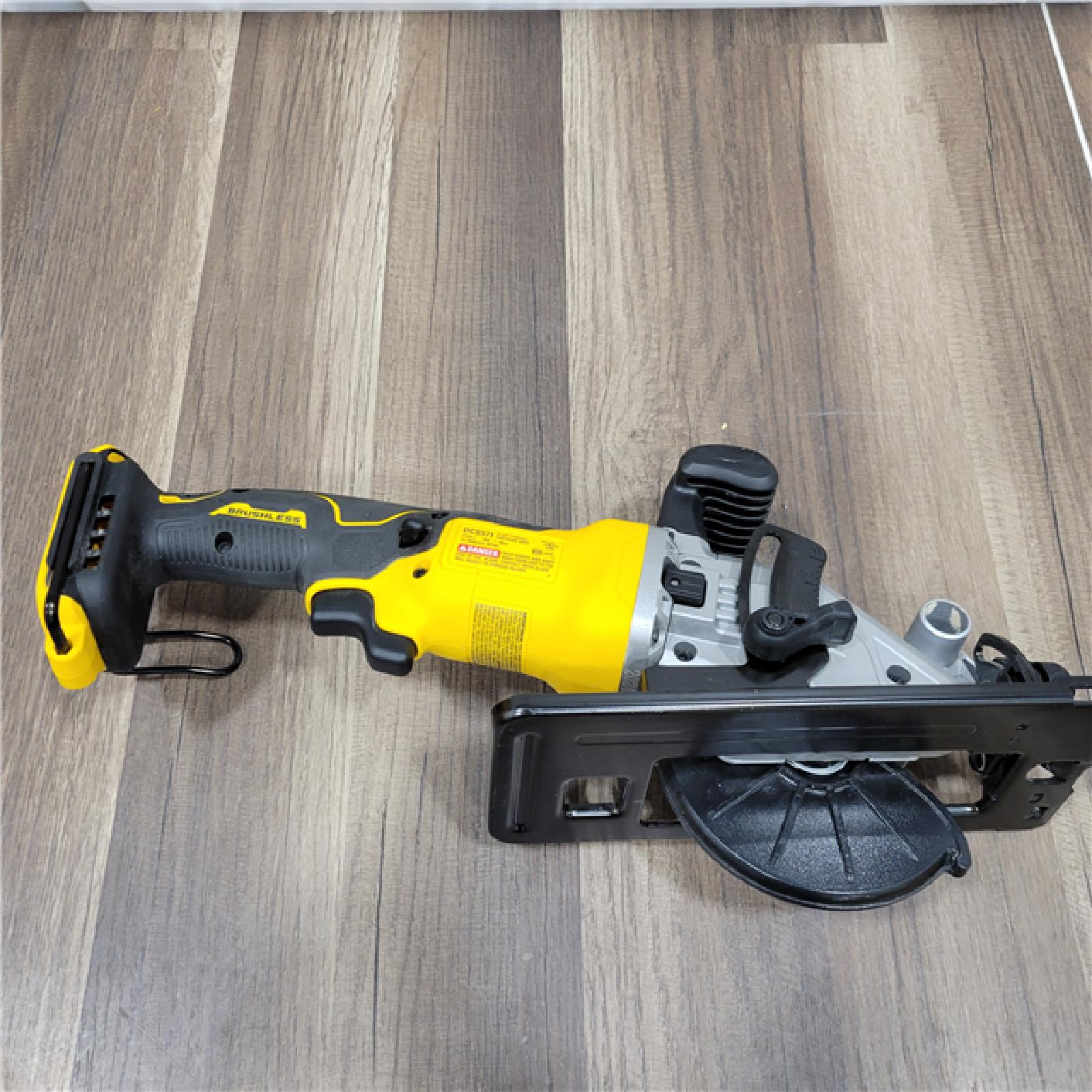 AS-IS  DEWALT ATOMIC 20V MAX Cordless Brushless 4-1/2 in. Circular Saw (Tool Only)