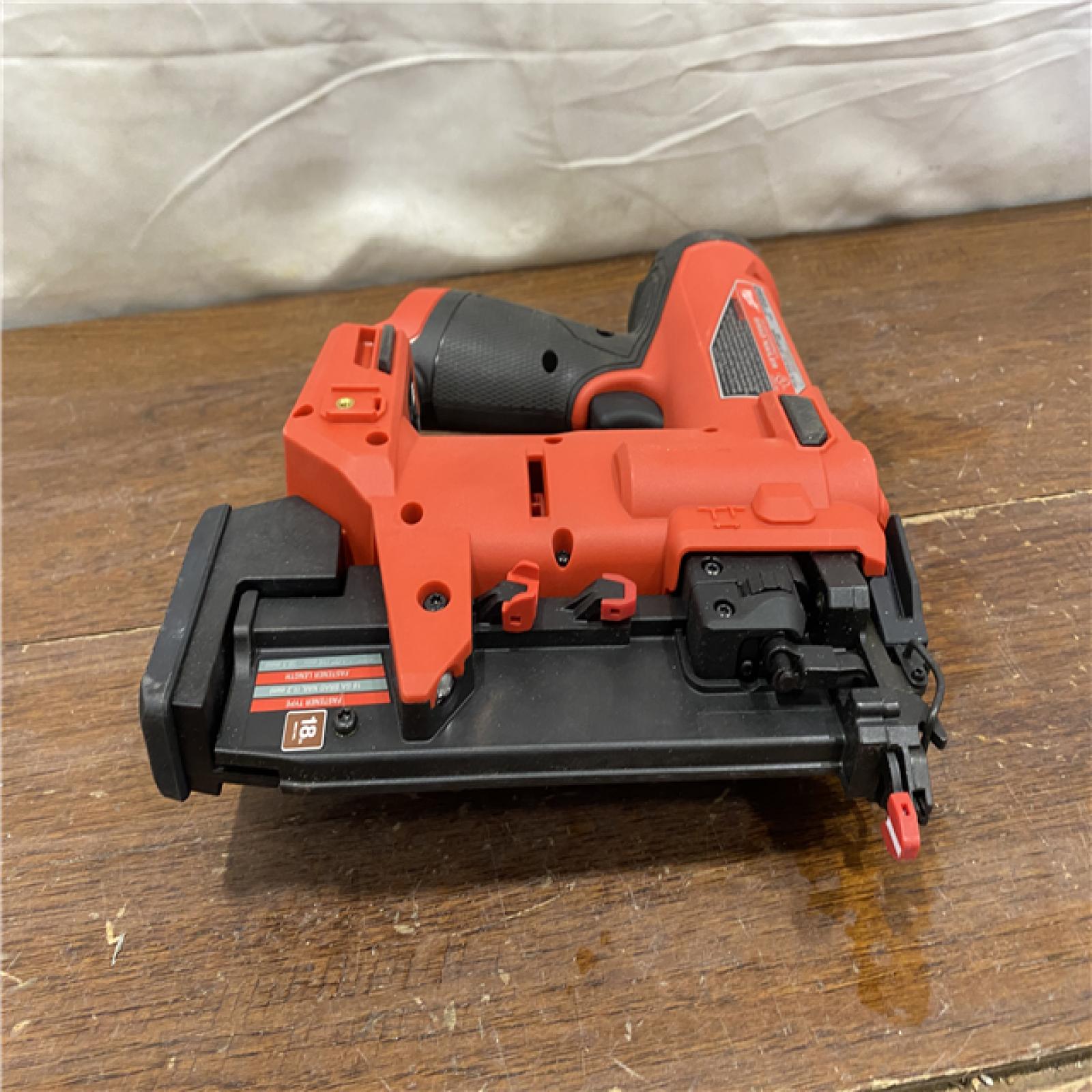 AS-IS M12 FUEL 12-Volt Lithium-Ion Brushless Cordless 18-Guage Compact Brad Nailer (Tool Only)
