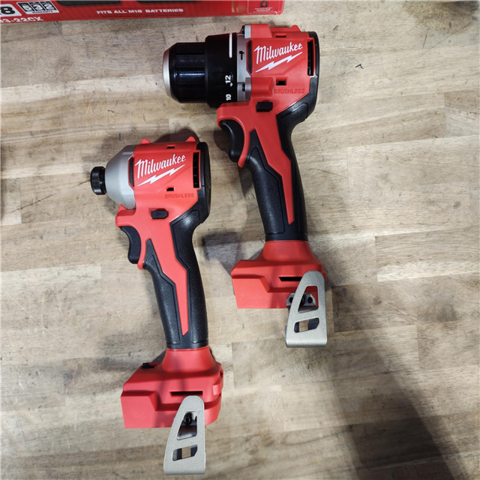 HOUSTON LOCATION - AS-IS M18 18-Volt Lithium-Ion Brushless Cordless Compact Hammer Drill/Impact Combo Kit (2-Tool) with (2) Batteries, Bag