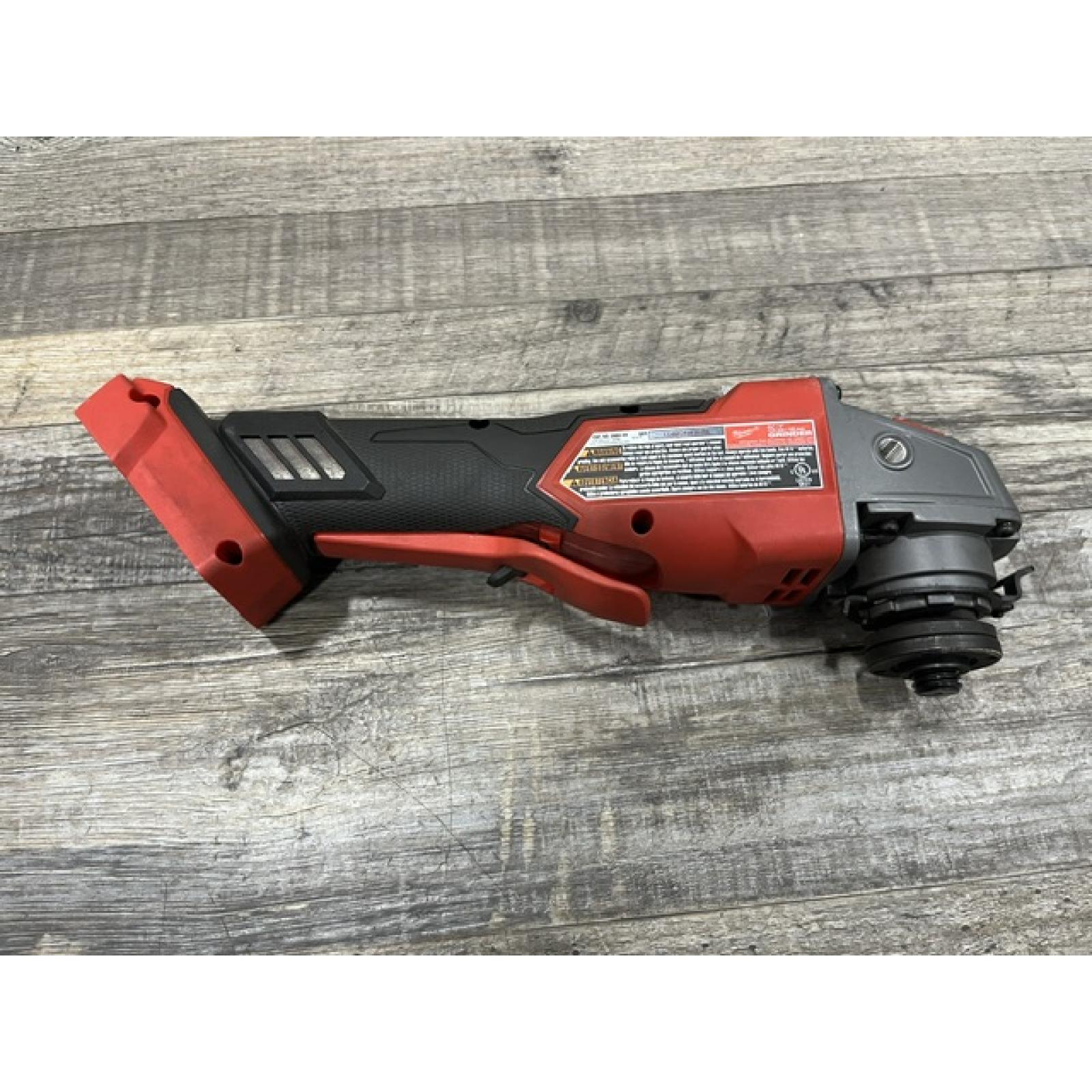 AS-IS Milwaukee FUEL 18V Lithium-Ion Brushless Cordless 4-1/2 in./5 in. Grinder w/Paddle Switch (Tool-Only)