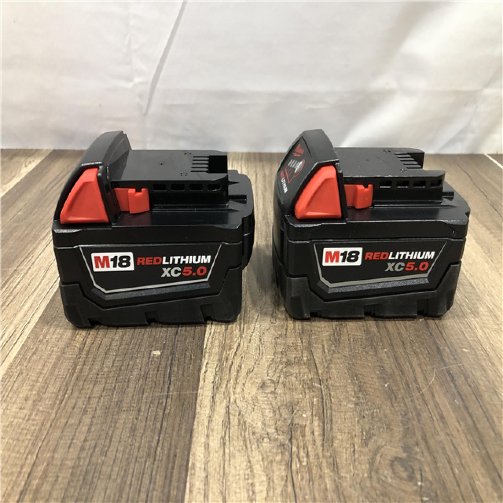 AS-IS Milwaukee 18-Volt Lithium-Ion XC Starter Kit with Two 5.0Ah Batteries and Charger