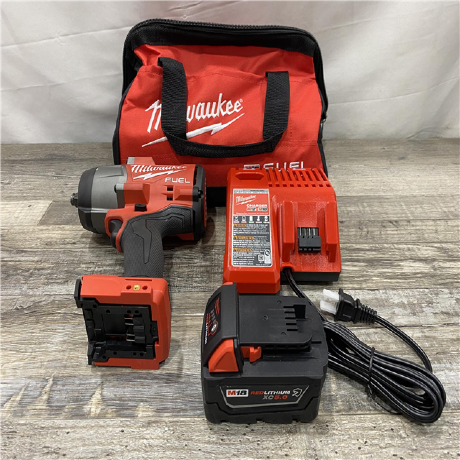 AS-IS Milwaukee FUEL 18V Lithium-Ion Brushless Cordless 1/2 in. Impact Wrench w/Friction Ring Kit