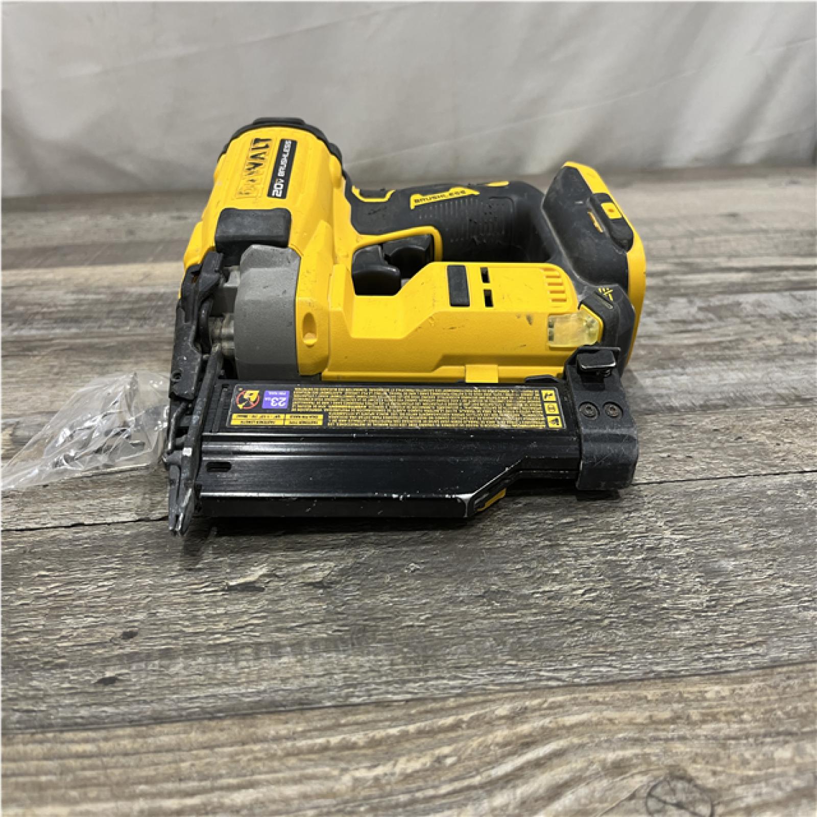 AS-IS DEWALT ATOMIC 20V MAX Lithium Ion Cordless 23 Gauge Pin Nailer (Tool Only)