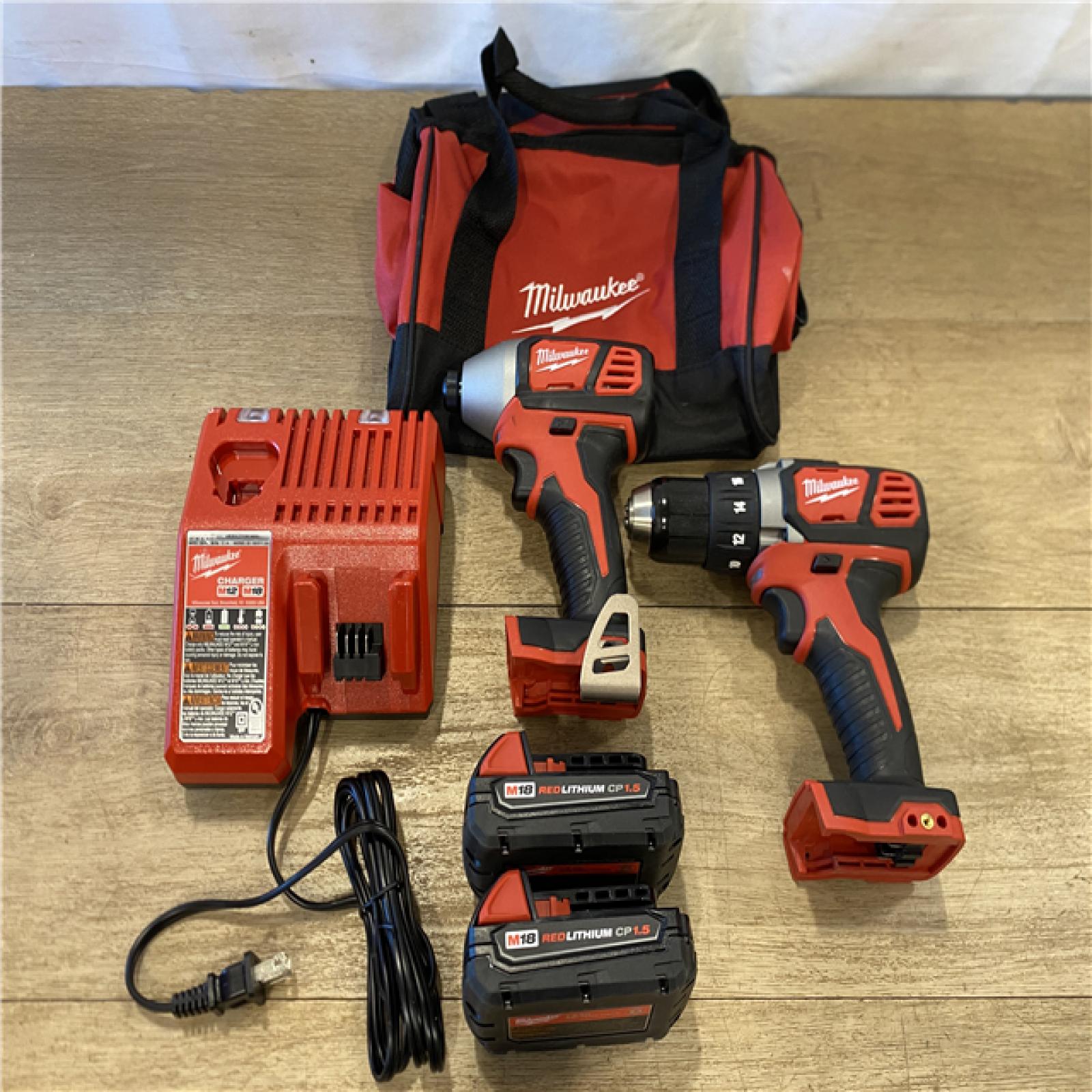 AS-IS Milwaukee 18V Lithium-Ion Cordless Drill Driver/Impact Driver Combo Kit