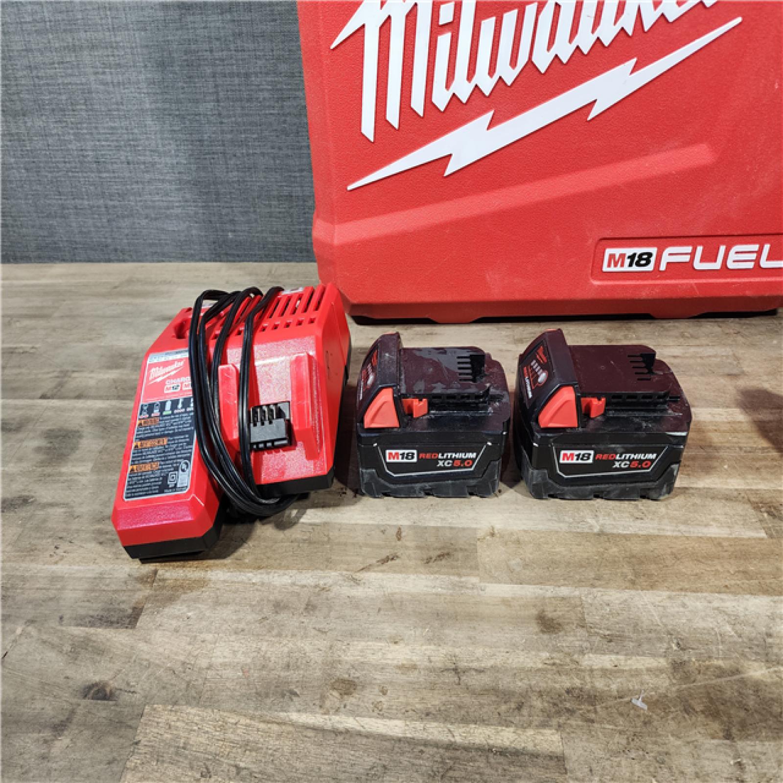 HOUSTON LOCATION - AS-IS MILWAUKEE FUEL 18V Lithium-Ion Brushless Cordless Hammer Drill and Impact Driver Combo Kit