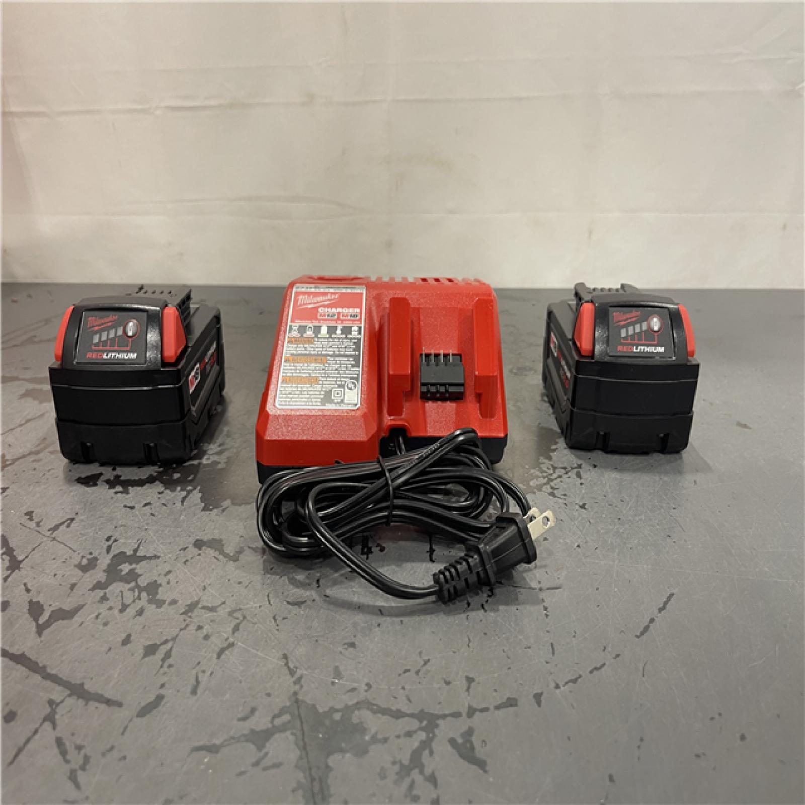 AS-IS- M18 18-Volt Lithium-Ion XC Starter Kit with Two 5.0Ah Batteries and Charger
