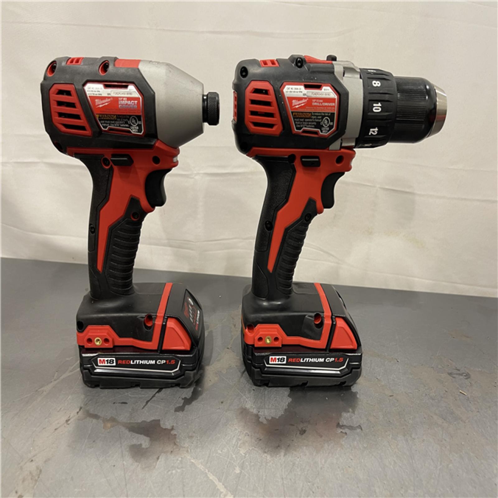 AS-IS - Milwaukee M18 18V Lithium-Ion Cordless Drill Driver/Impact Driver Combo Kit