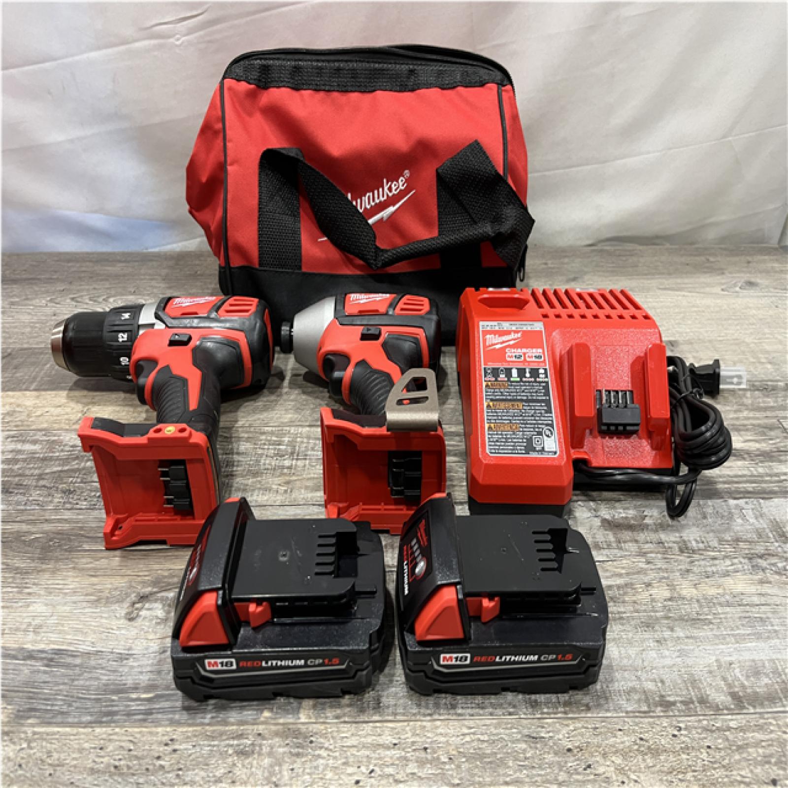 AS-IS Milwaukee 18V Lithium-Ion Cordless Drill Driver/Impact Driver Combo Kit