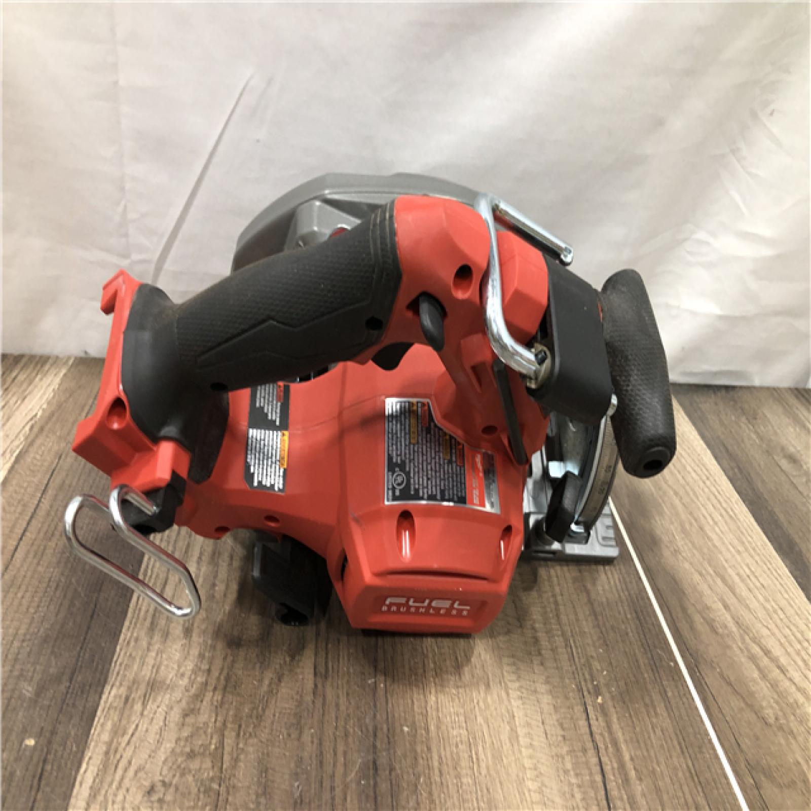 AS-IS Milwaukee  FUEL 18V Lithium-Ion Brushless Cordless 6-1/2 in. Circular Saw (Tool-Only)