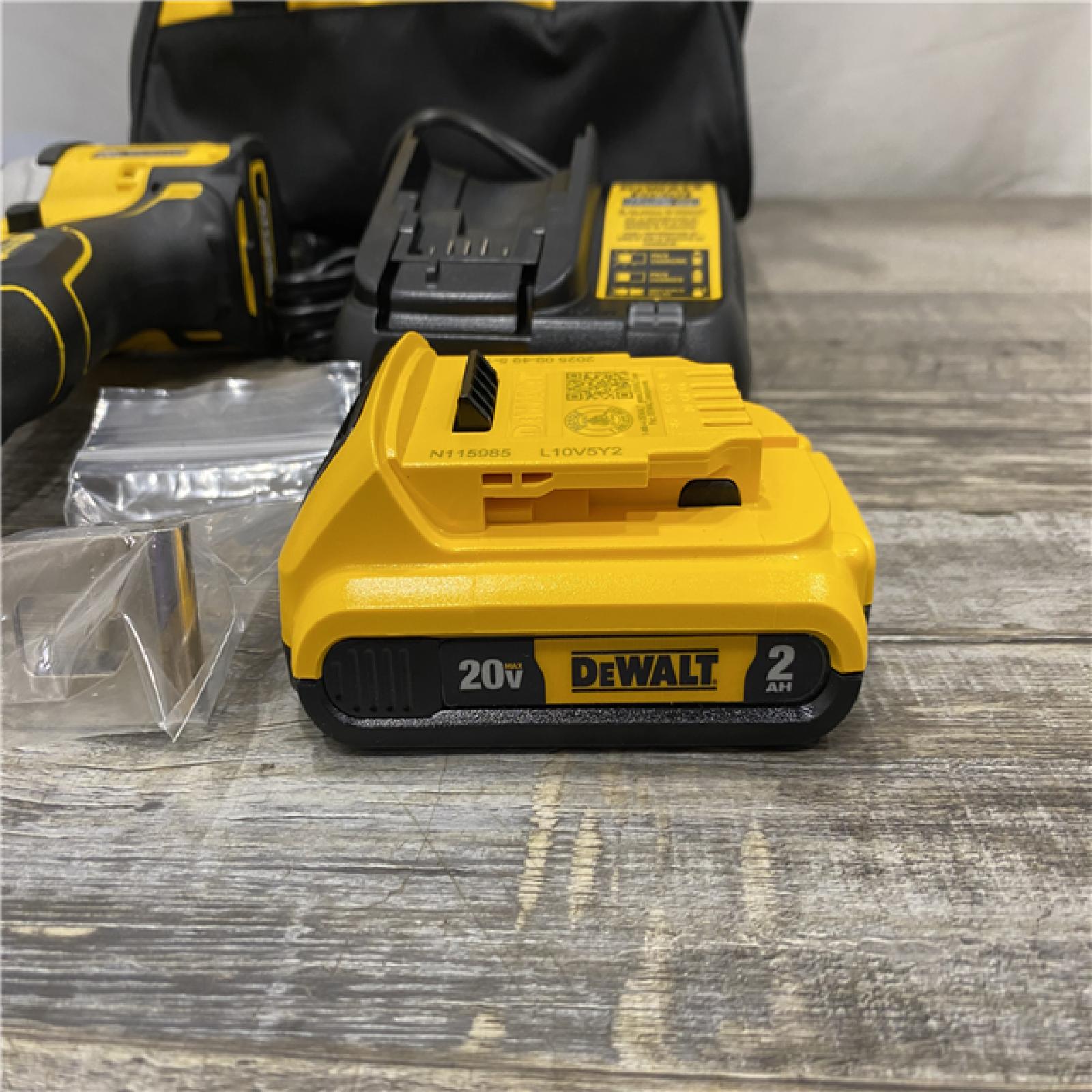 AS-IS DEWALT Atomic 20V Max Lithium-Ion Brushless Cordless Compact 1/4 in. Impact Driver Kit