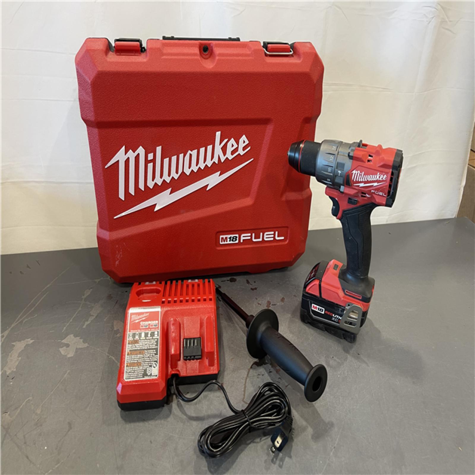 AS-IS -  - Milwaukee M18 FUEL 18V Lithium-Ion Brushless Cordless 1/2 in. Hammer Drill Driver Kit