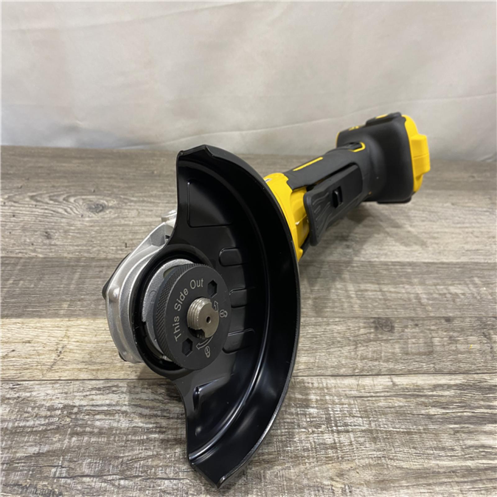 AS-IS DEWALT 20V MAX XR Cordless Brushless 4.5 in. Paddle Switch Small Angle Grinder with Kickback Brake (Tool Only)