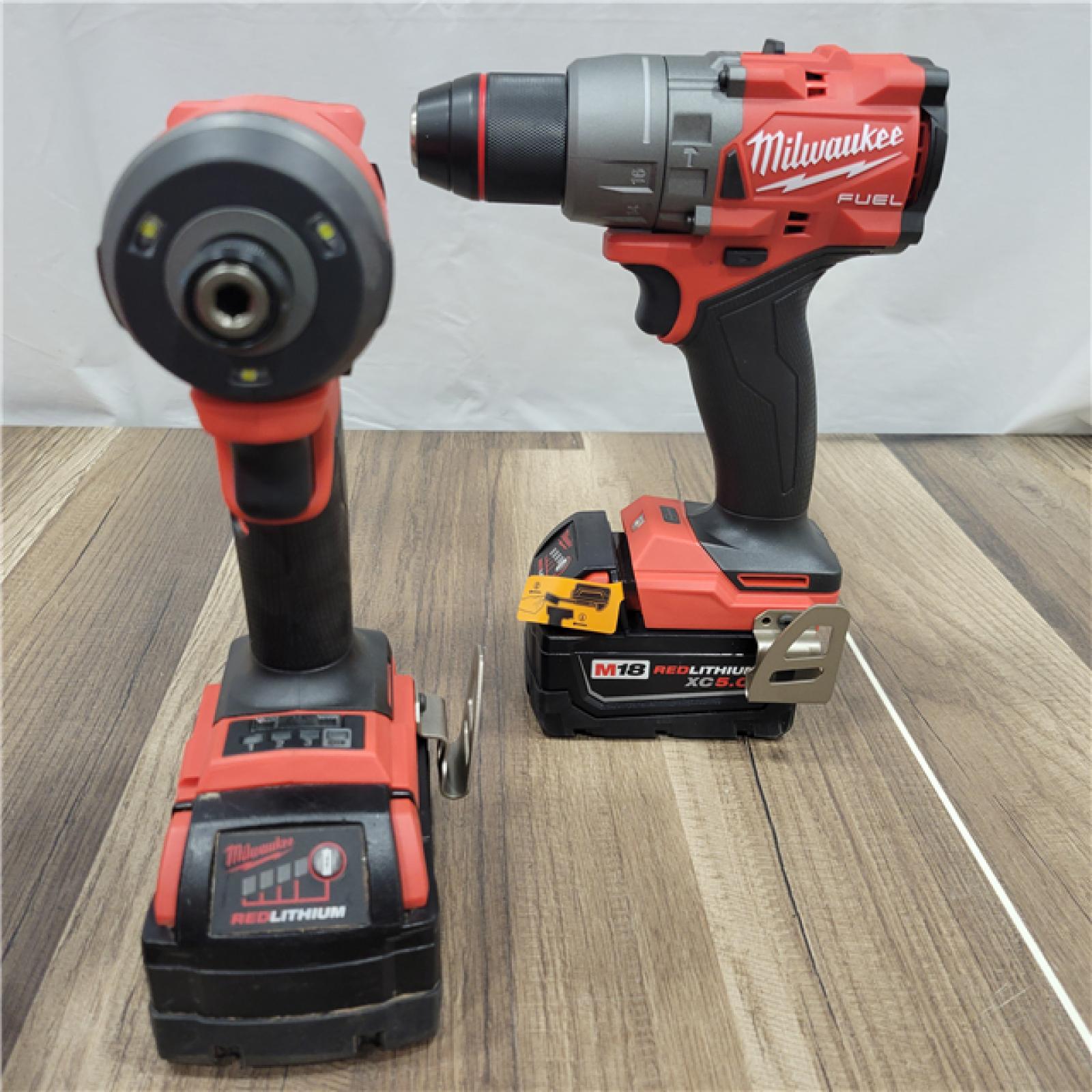 AS-IS MILWAUKEE M18 FUEL 18V Lithium-Ion Brushless Cordless Hammer Drill and Impact Driver Combo Kit (2-Tool) with 2 Batteries