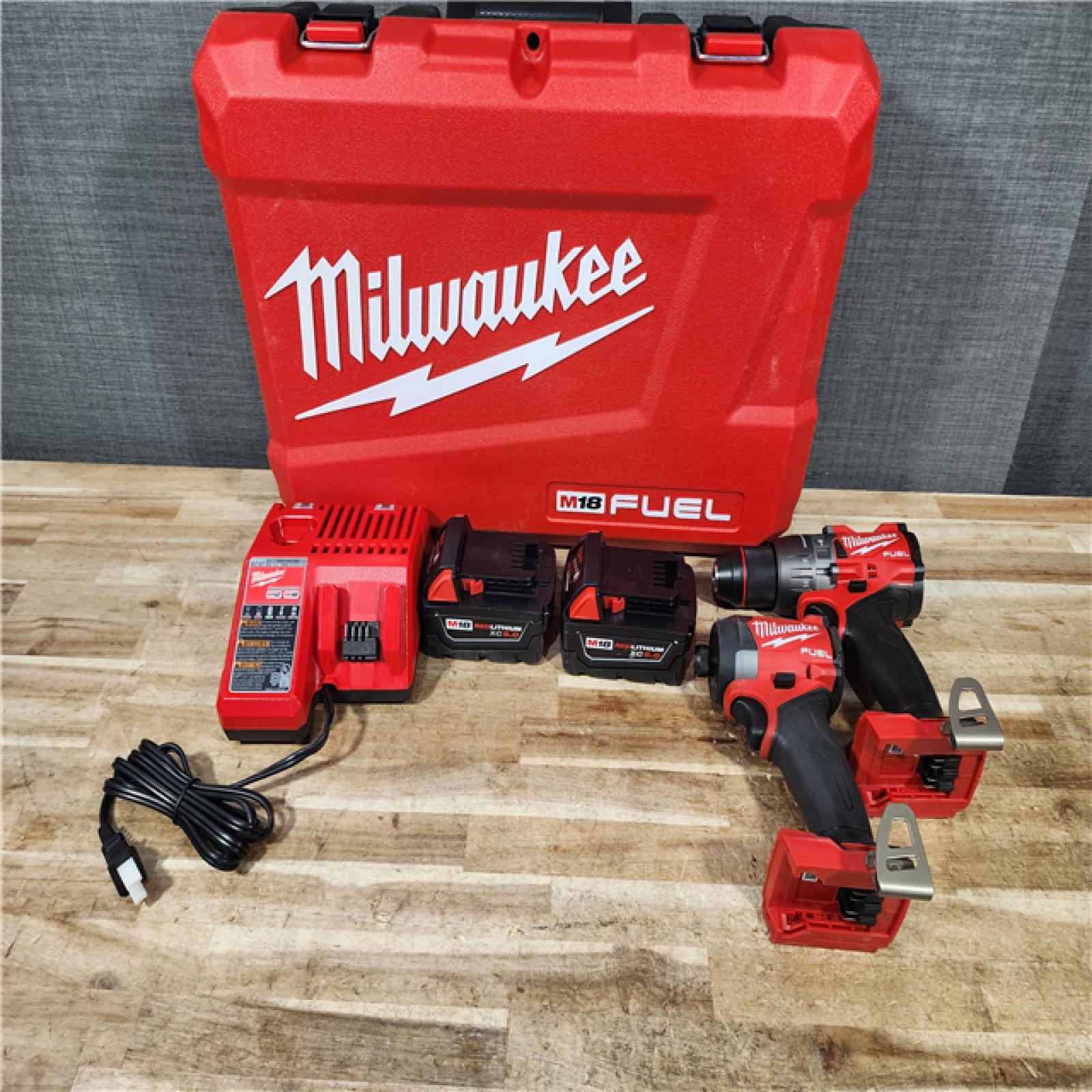 HOUSTON LOCATION - AS - IS Milwaukee FUEL 18V Lithium-Ion Brushless Cordless Hammer Drill and Impact Driver Combo Kit
