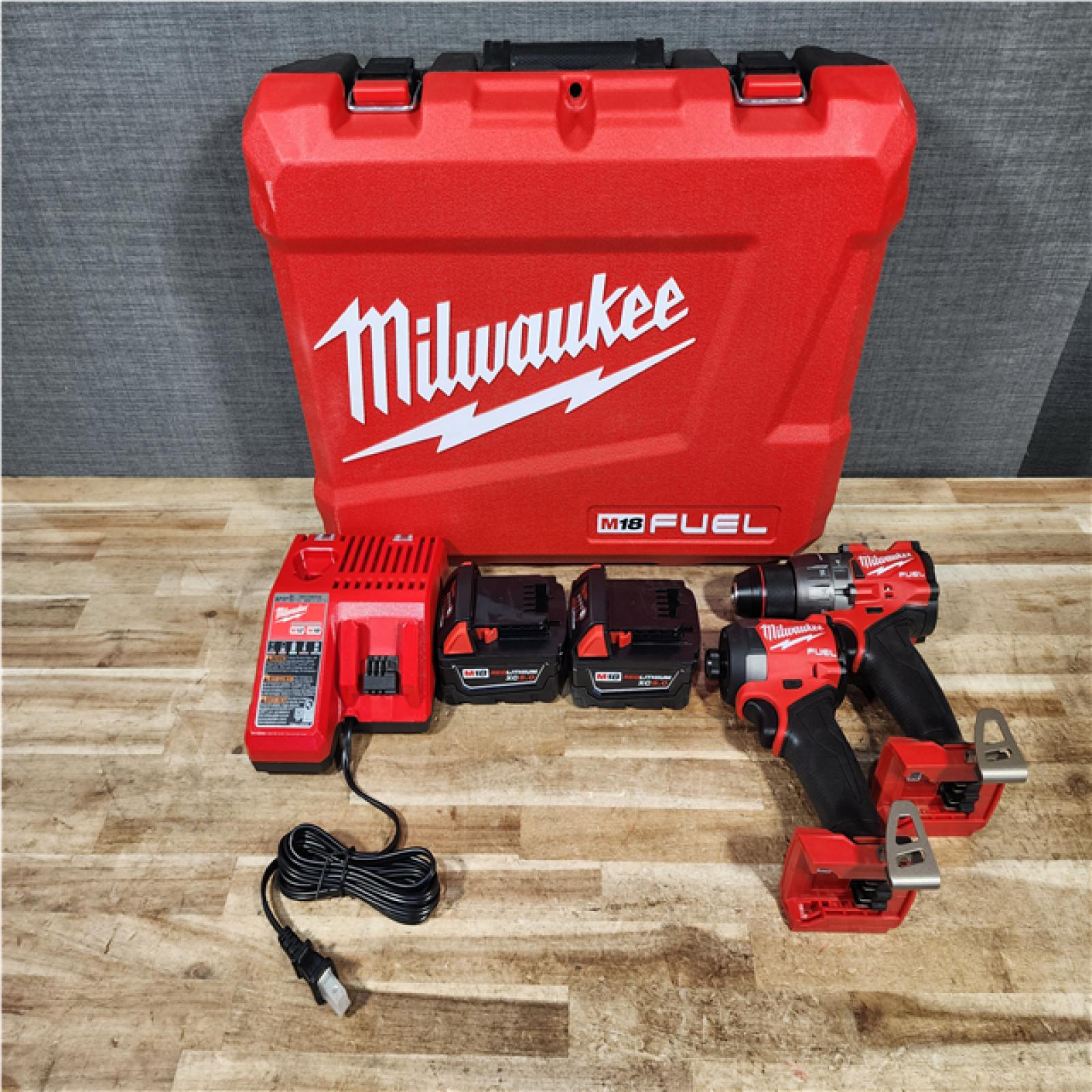 HOUSTON LOCATION - AS - IS Milwaukee FUEL 18V Lithium-Ion Brushless Cordless Hammer Drill and Impact Driver Combo Kit
