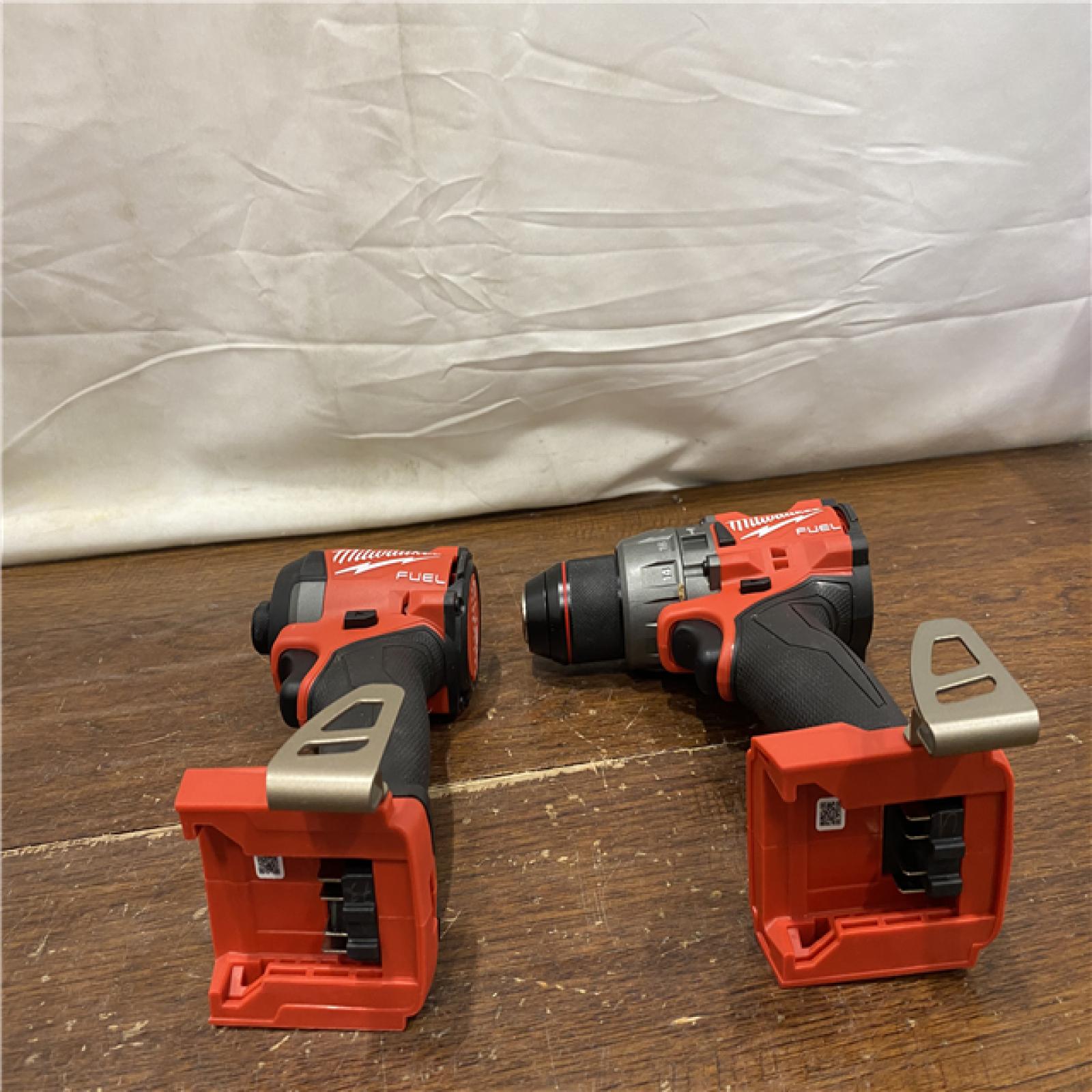 AS-IS MILWAUKEE M18 FUEL 18V Lithium-Ion Brushless Cordless Hammer Drill and Impact Driver Combo Kit (2-Tool) with 2 Batteries