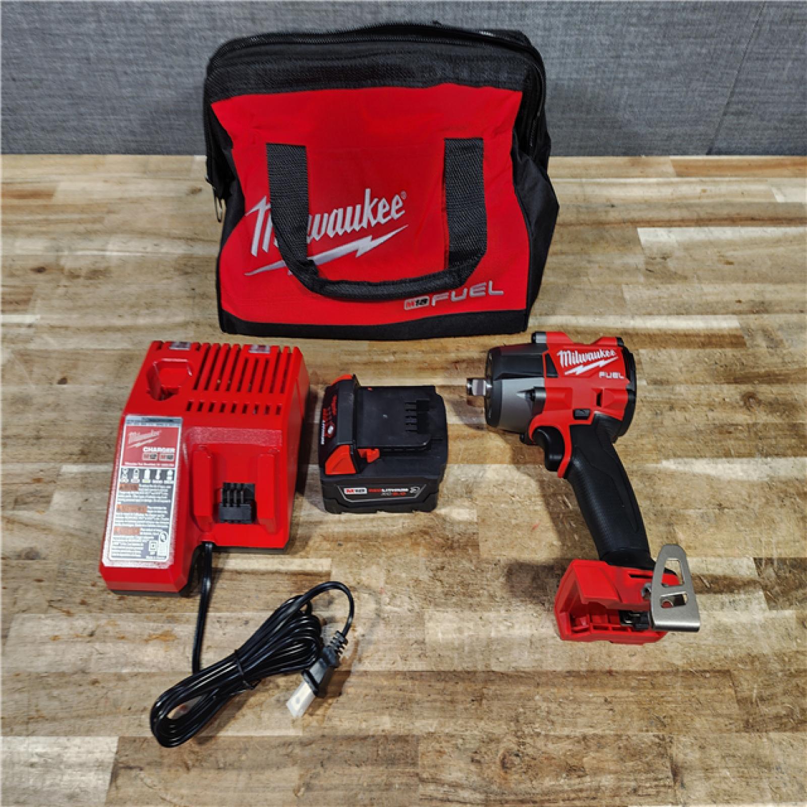 HOUSTON LOCATION - AS - IS Milwaukee FUEL Gen-2 18V Lithium-Ion Brushless Cordless Mid Torque 1/2 in. Impact Wrench w/Friction Ring COMBO KIT