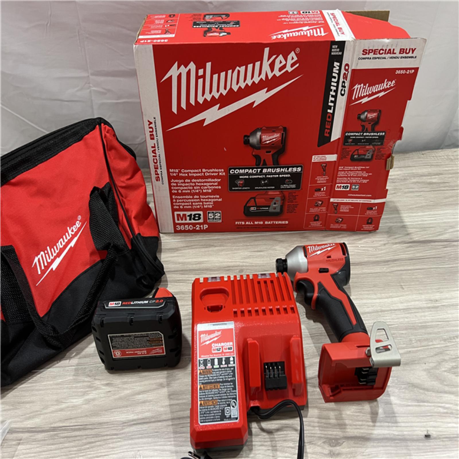 AS-IS Milwaukee 18-Volt Lithium-Ion Compact Brushless Cordless 1/4 in. Impact Driver Kit