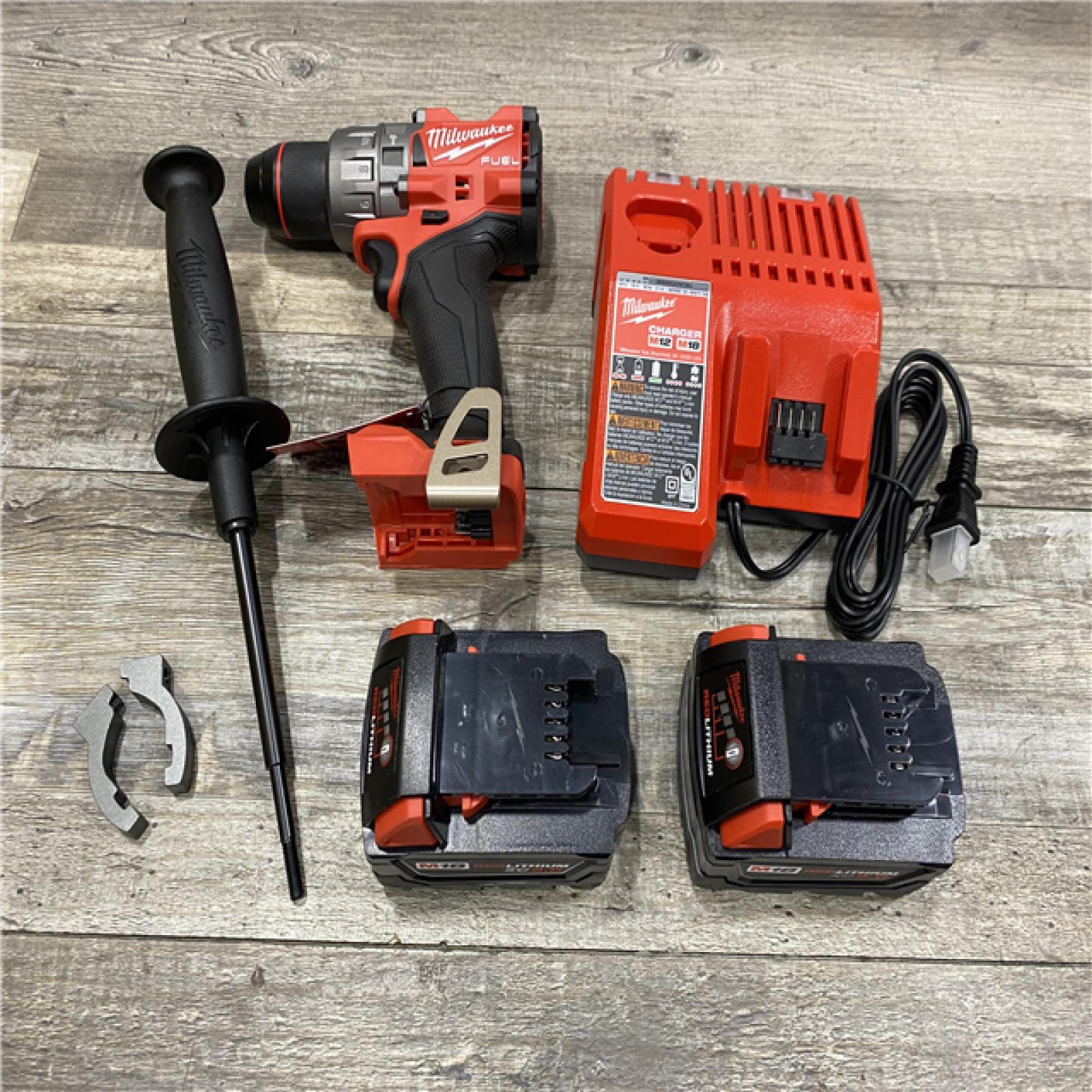 AS-IS Milwaukee FUEL 18V Lithium-Ion Brushless Cordless 1/2 in. Hammer Drill Driver Kit