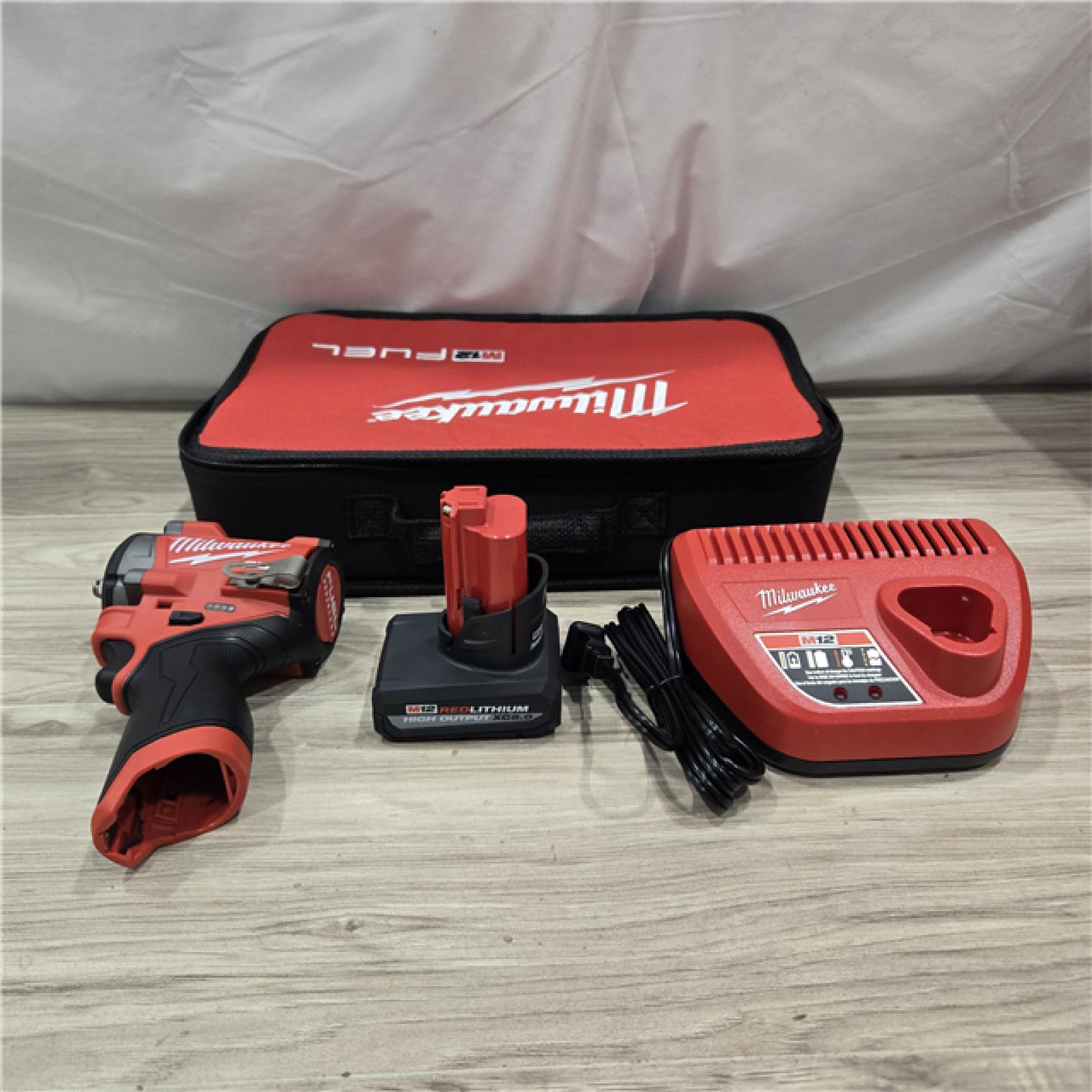 AS-IS Milwaukee M12 FUEL 12V Li-Ion Cordless Stubby 3/8 in. Impact Wrench Kit