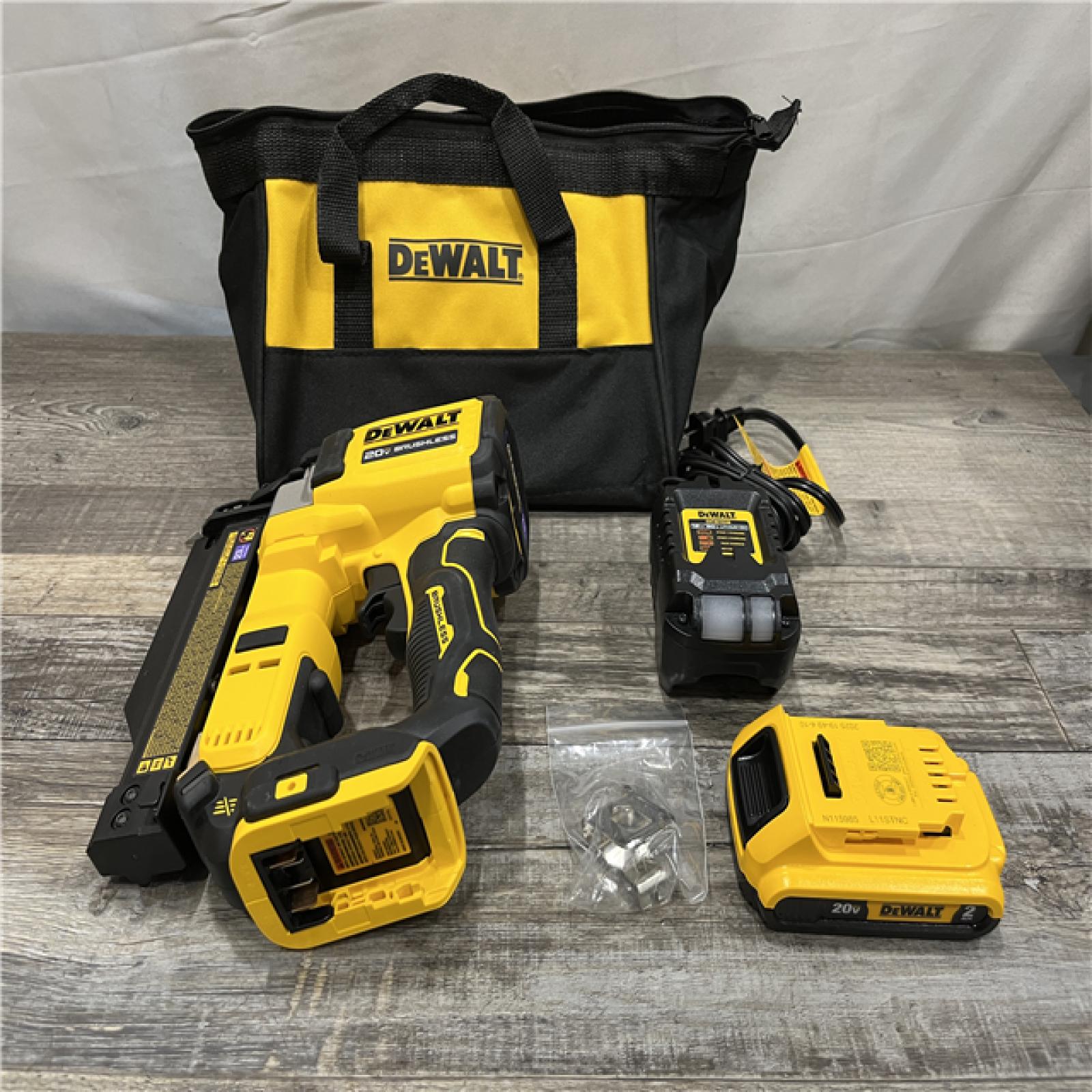 AS-IS DEWALT ATOMIC 20V MAX Lithium Ion Cordless 23 Gauge Pin Nailer Kit