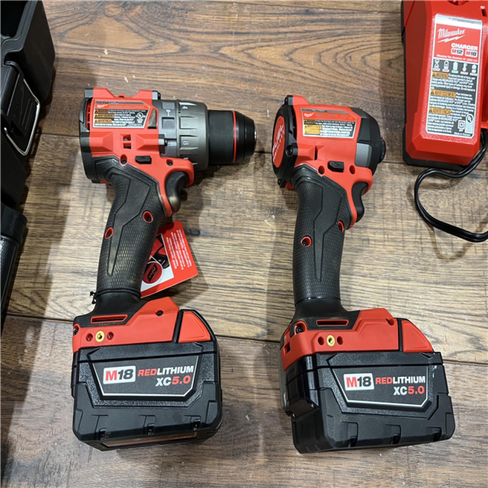 AS-IS Milwaukee M18 FUEL 18V Lithium-Ion Brushless Cordless Hammer Drill and Impact Driver Combo Kit (2-Tool) with 2 Batteries