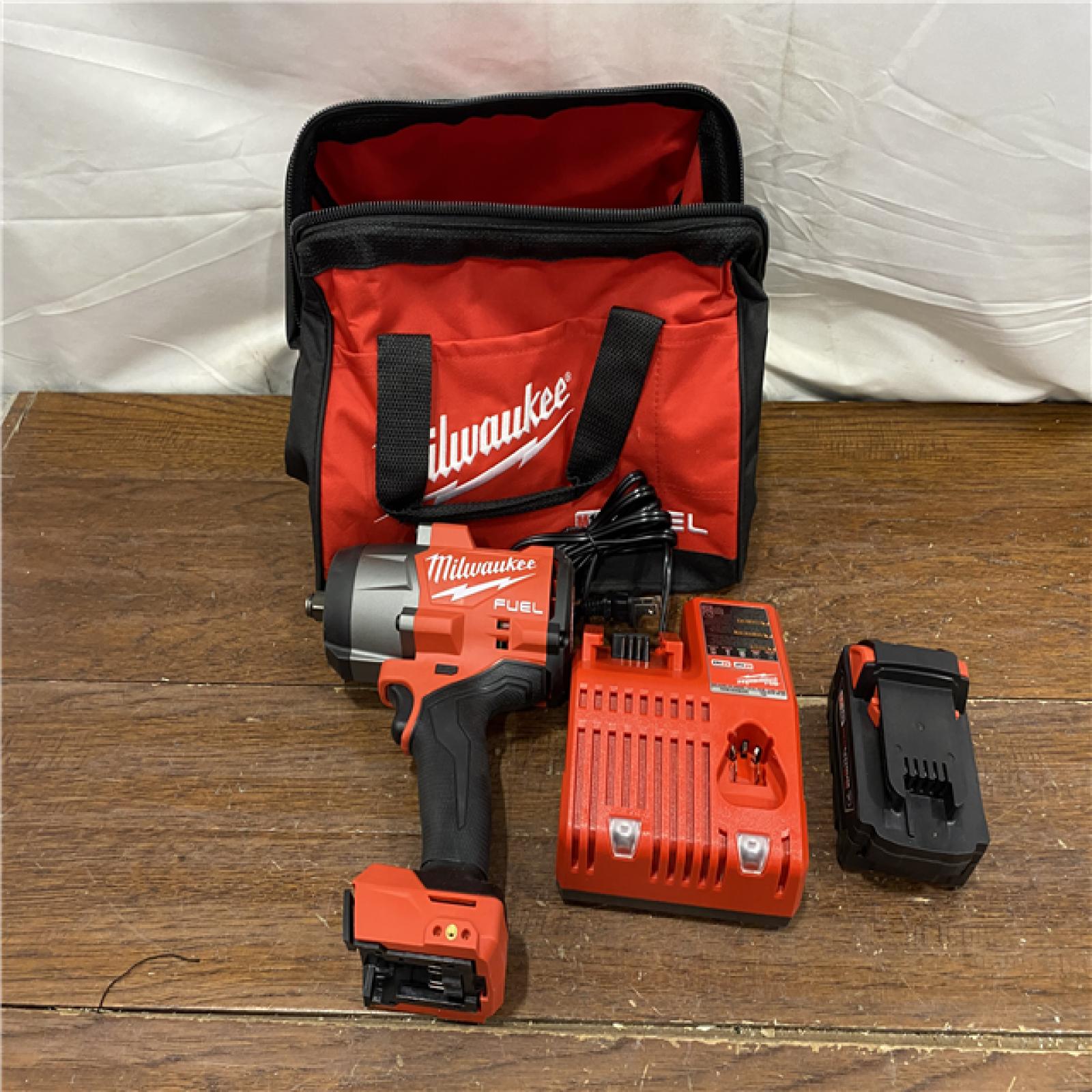 AS-IS Milwaukee M18 FUEL 1/2 High Torque Impact Wrench with Friction Ring Kit