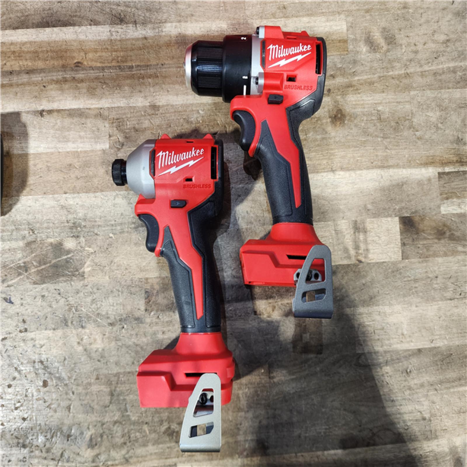 HOUSTON LOCATION - AS-IS Milwaukee M18 18V Lithium-Ion Brushless Cordless Compact Drill/Impact Combo Kit (2-Tool) W/(2) 2.0 Ah Batteries  Charger & Bag