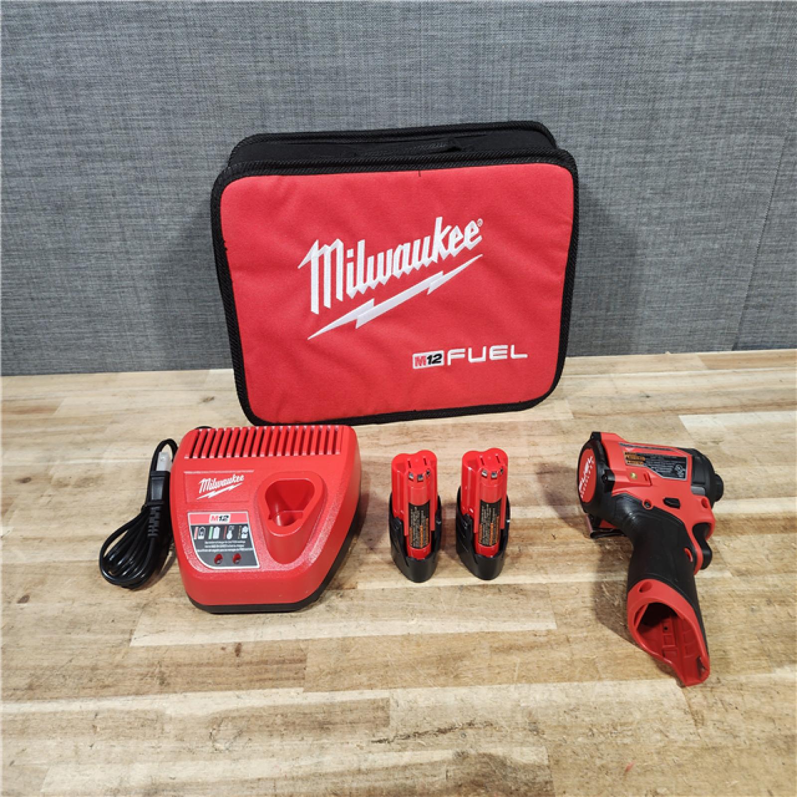 HOUSTON LOCATION - AS - IS Milwaukee FUEL 12V Lithium-Ion Brushless Cordless 1/4 in. Hex Impact Driver Kit