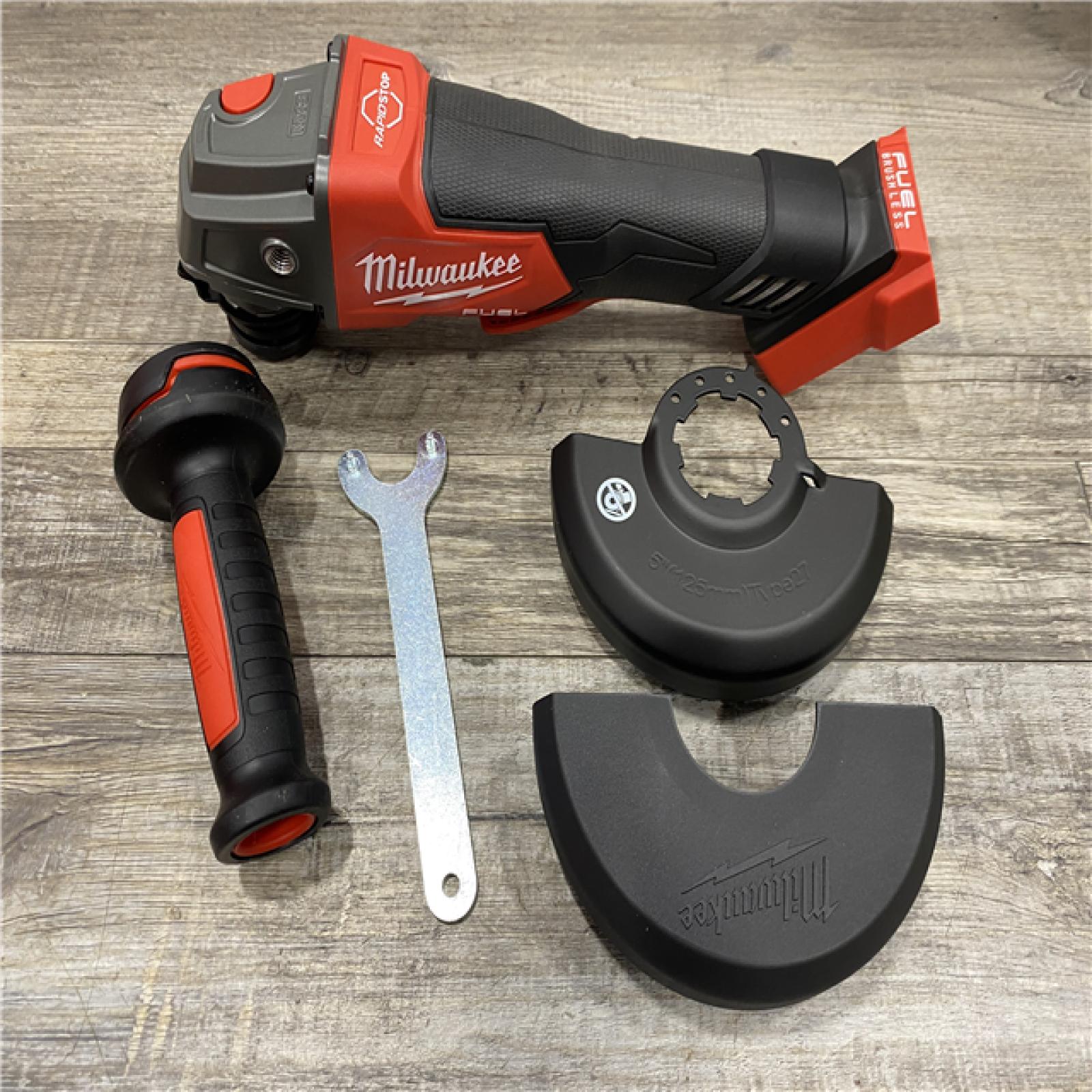 AS-IS Milwaukee FUEL 18V Lithium-Ion Brushless Cordless 4-1/2 in./5 in. Grinder w/Paddle Switch (Tool-Only)
