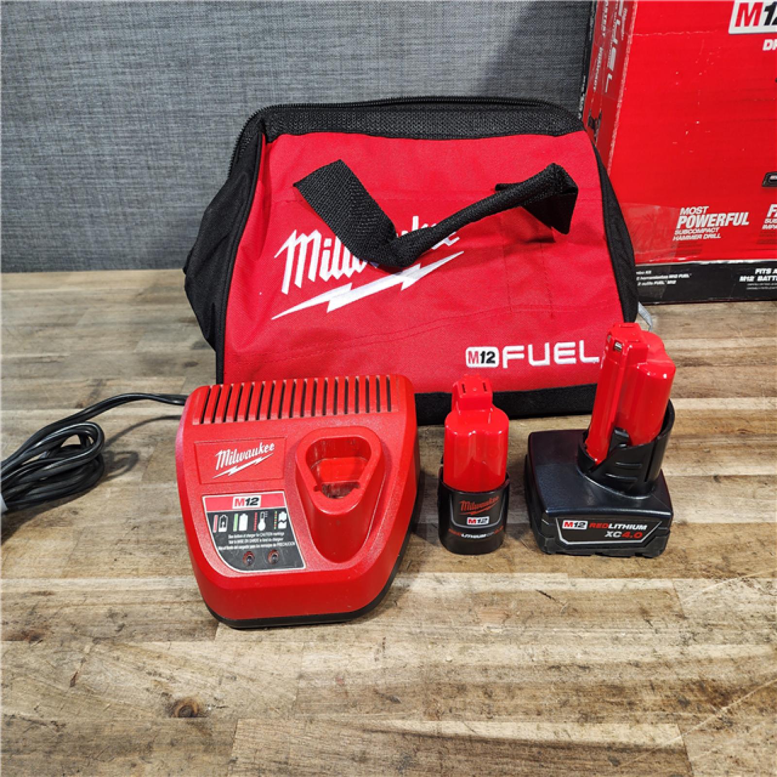 HOUSTON LOCATION - AS-IS Milwaukee FUEL 12-Volt Lithium-Ion Brushless Cordless Hammer Drill and Impact Driver Combo Kit