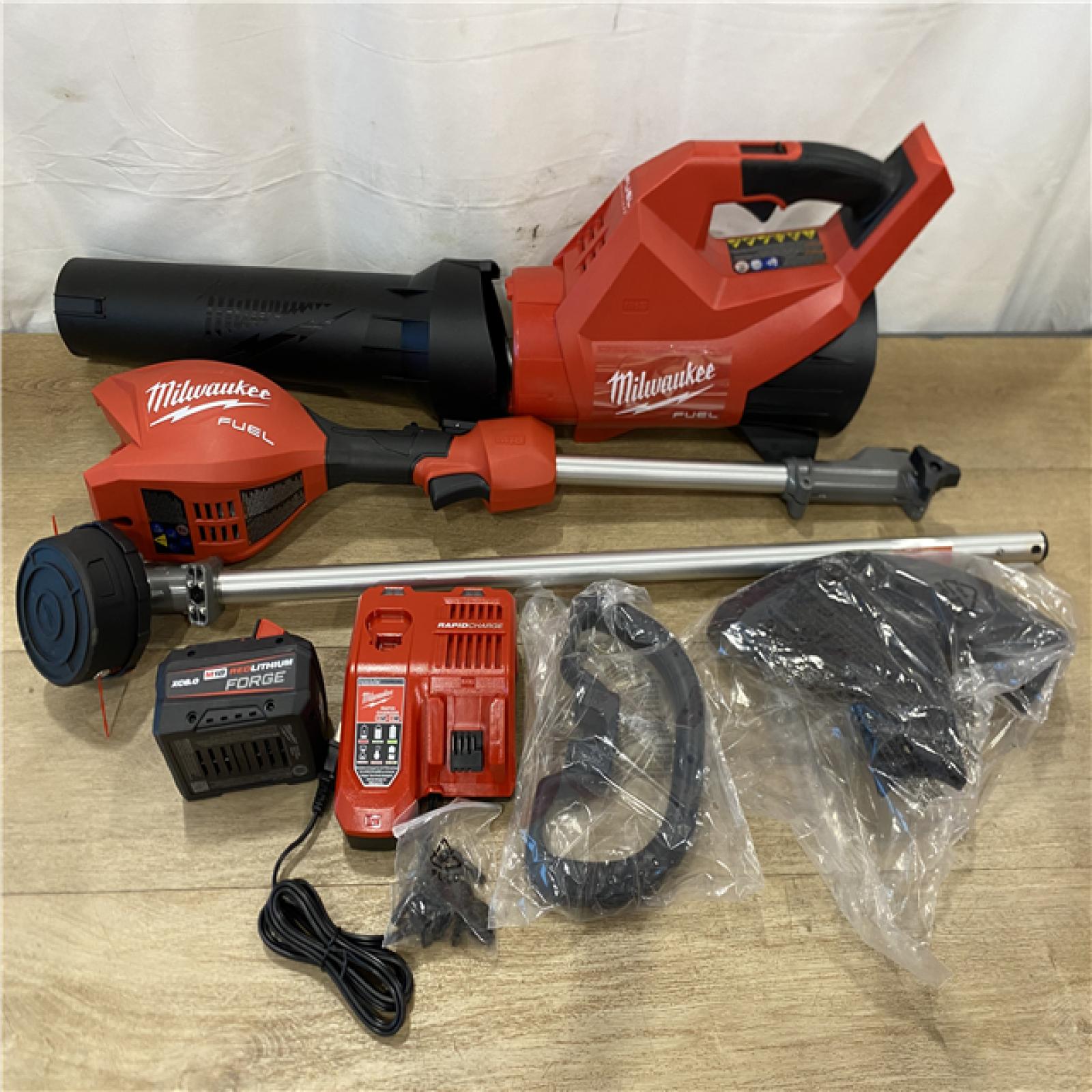 AS-IS Milwaukee M18 FUEL String Trimmer/Blower Combo Kit