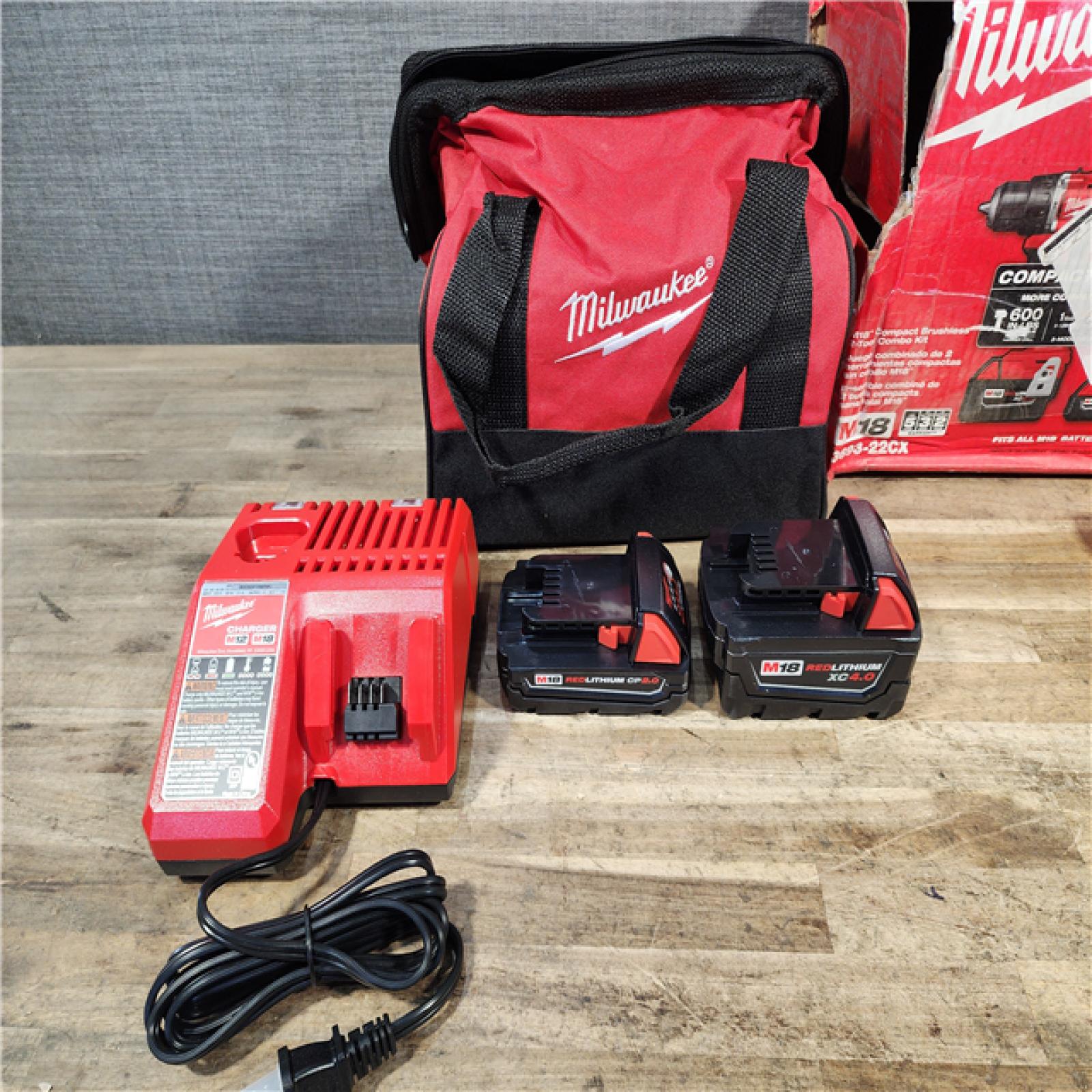 HOUSTON LOCATION - AS-IS Milwaukee 18-Volt Lithium-Ion Brushless Cordless Compact Hammer Drill/Impact Combo Kit