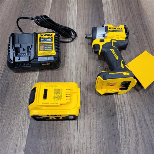 LIKE NEW! DEWALT ATOMIC 20V MAX Lithium-Ion Brushless Cordless 1/2 in. Variable Speed Impact Wrench Kit with 5 Ah Battery and Charger