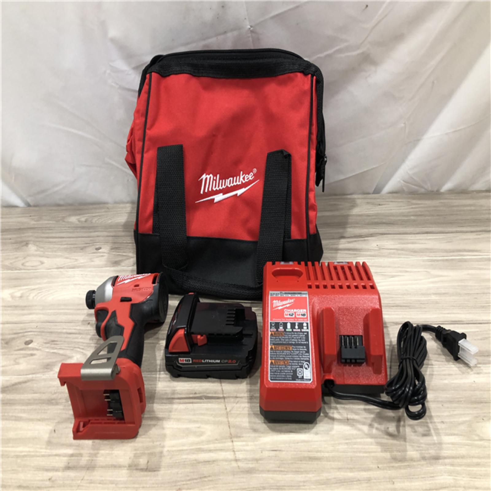 AS-IS Milwaukee M18 Compact Brushless 1/4  Hex Impact Driver Kit
