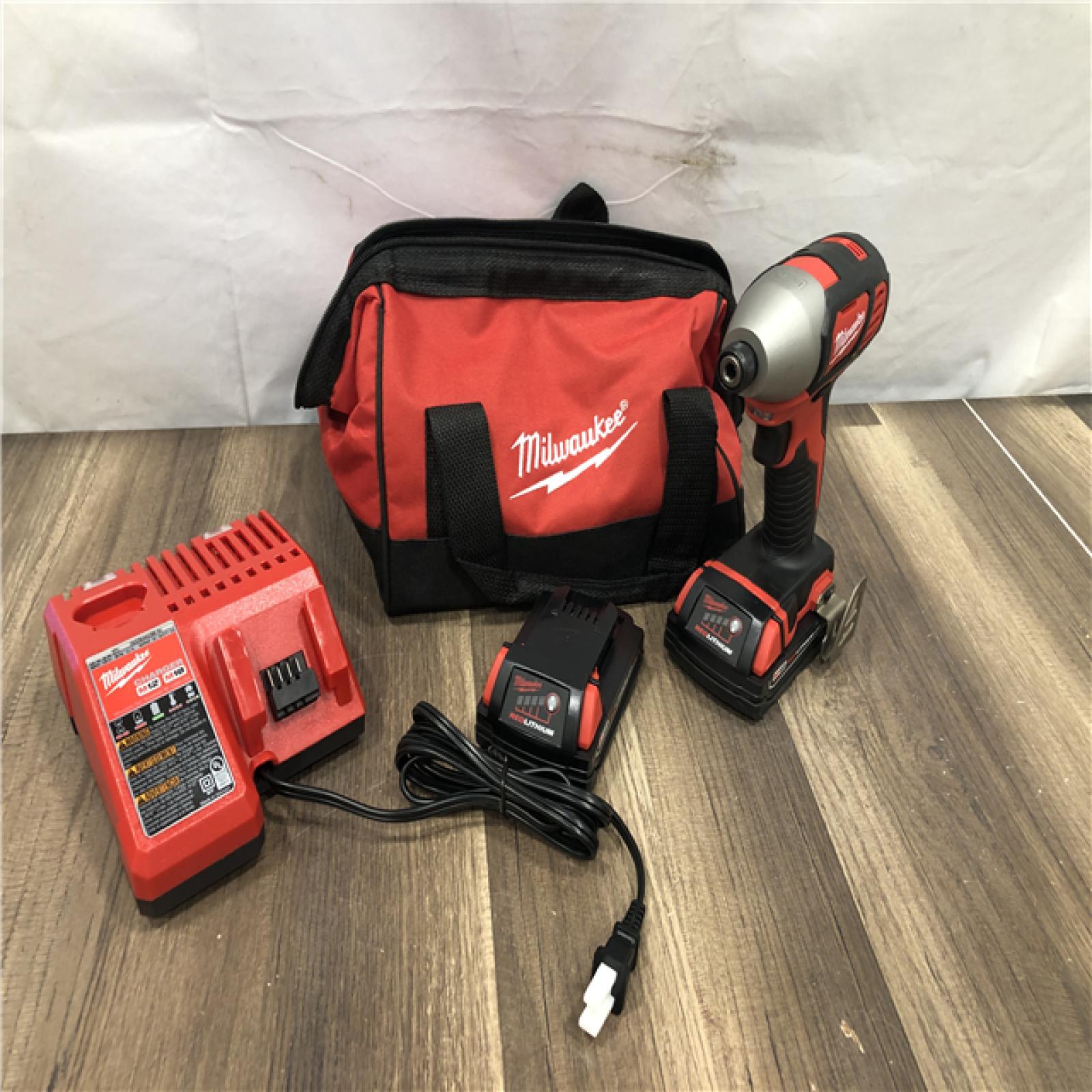 AS-IS Milwaukee M18 18V Lithium-Ion Cordless 1/4 in. Impact Driver Kit