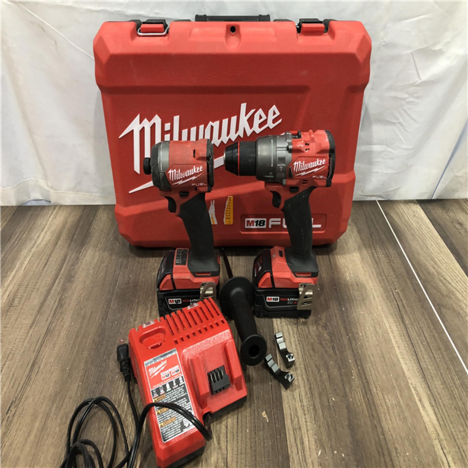 AS-IS Milwaukee FUEL 18V Lithium-Ion Brushless Cordless Hammer Drill and Impact Driver Combo Kit