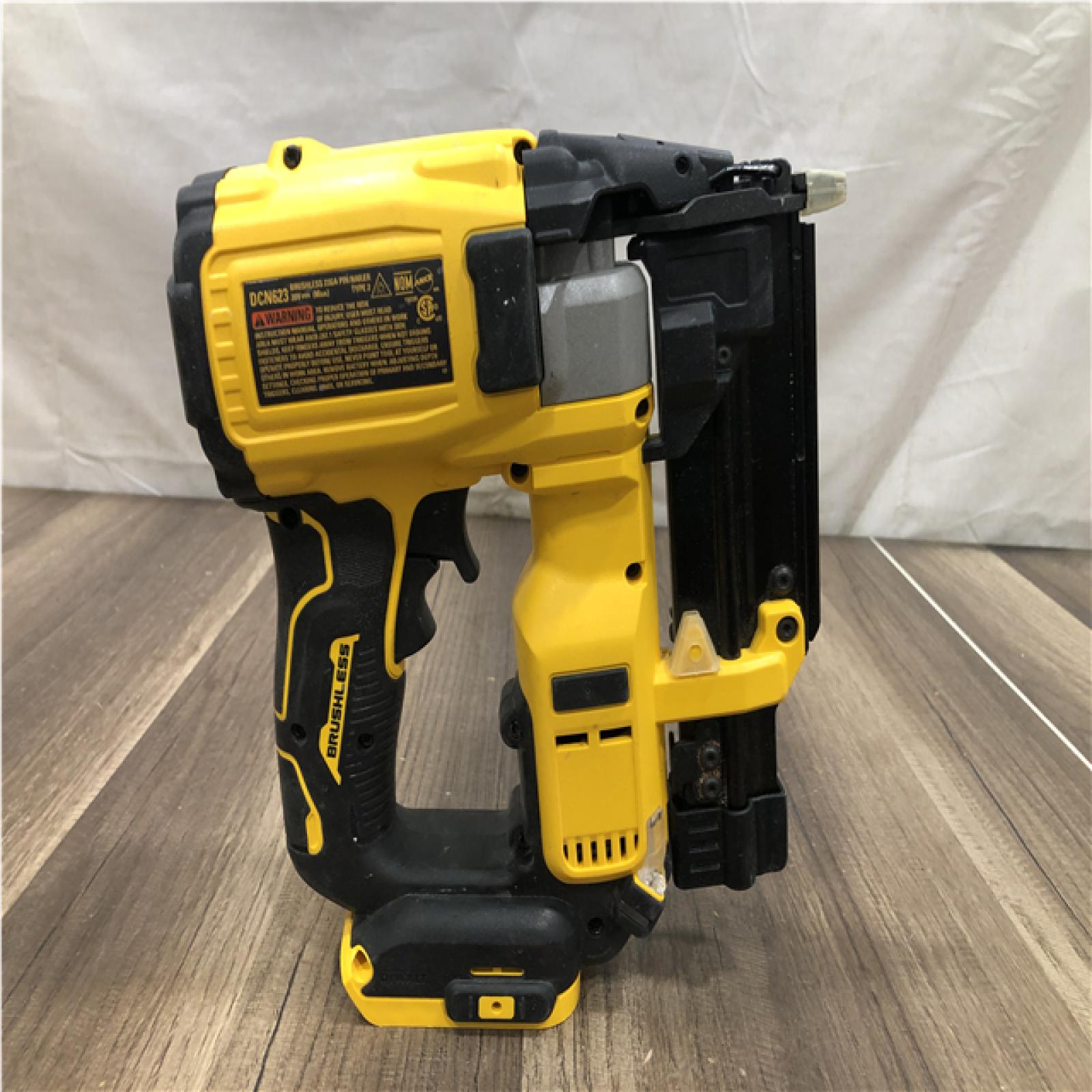 AS-IS DEWALT ATOMIC 20V MAX Lithium Ion Cordless 23 Gauge Pin Nailer (Tool Only)
