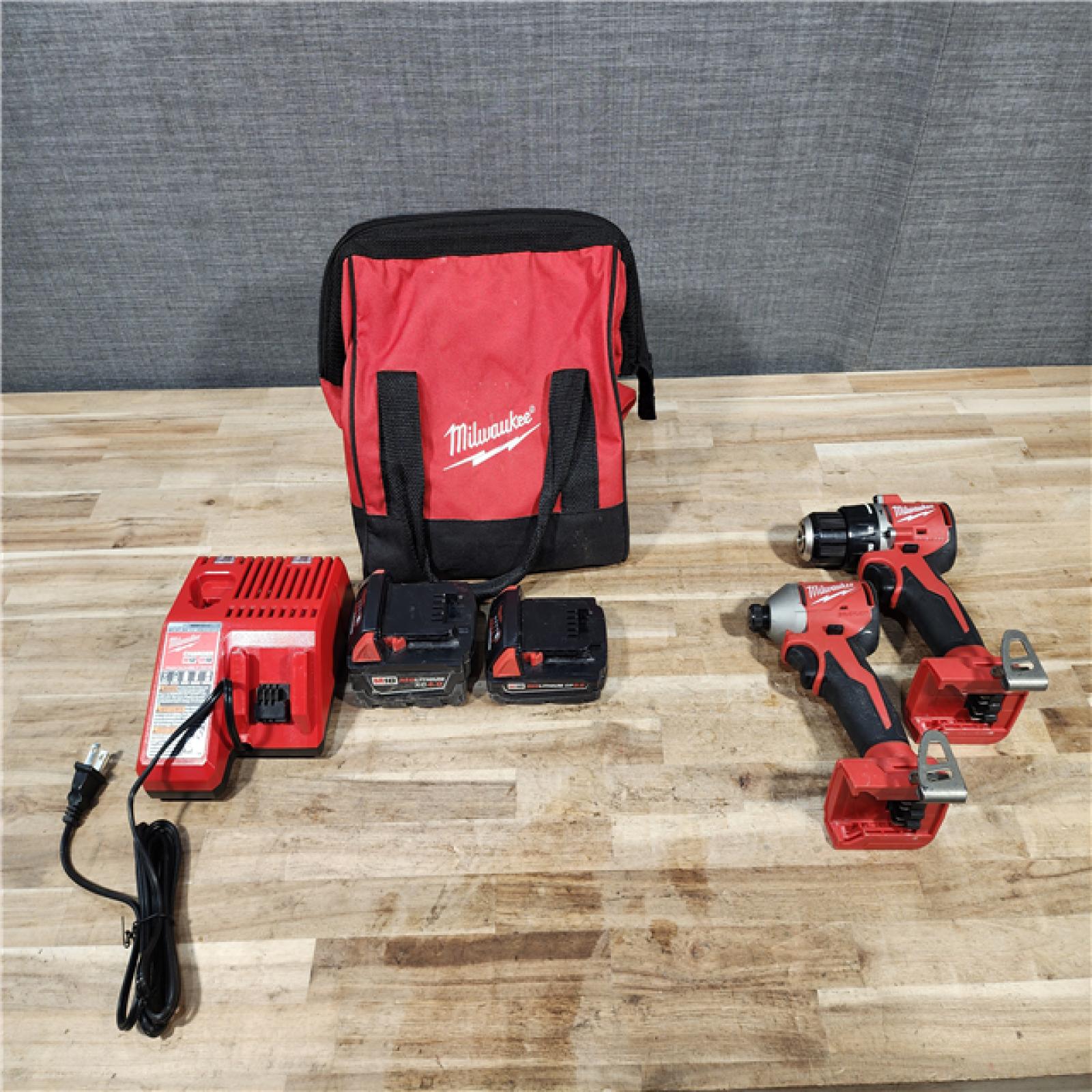 HOUSTON LOCATION - AS-IS Milwaukee 18-Volt Lithium-Ion Brushless Cordless Compact Hammer Drill/Impact Combo Kit