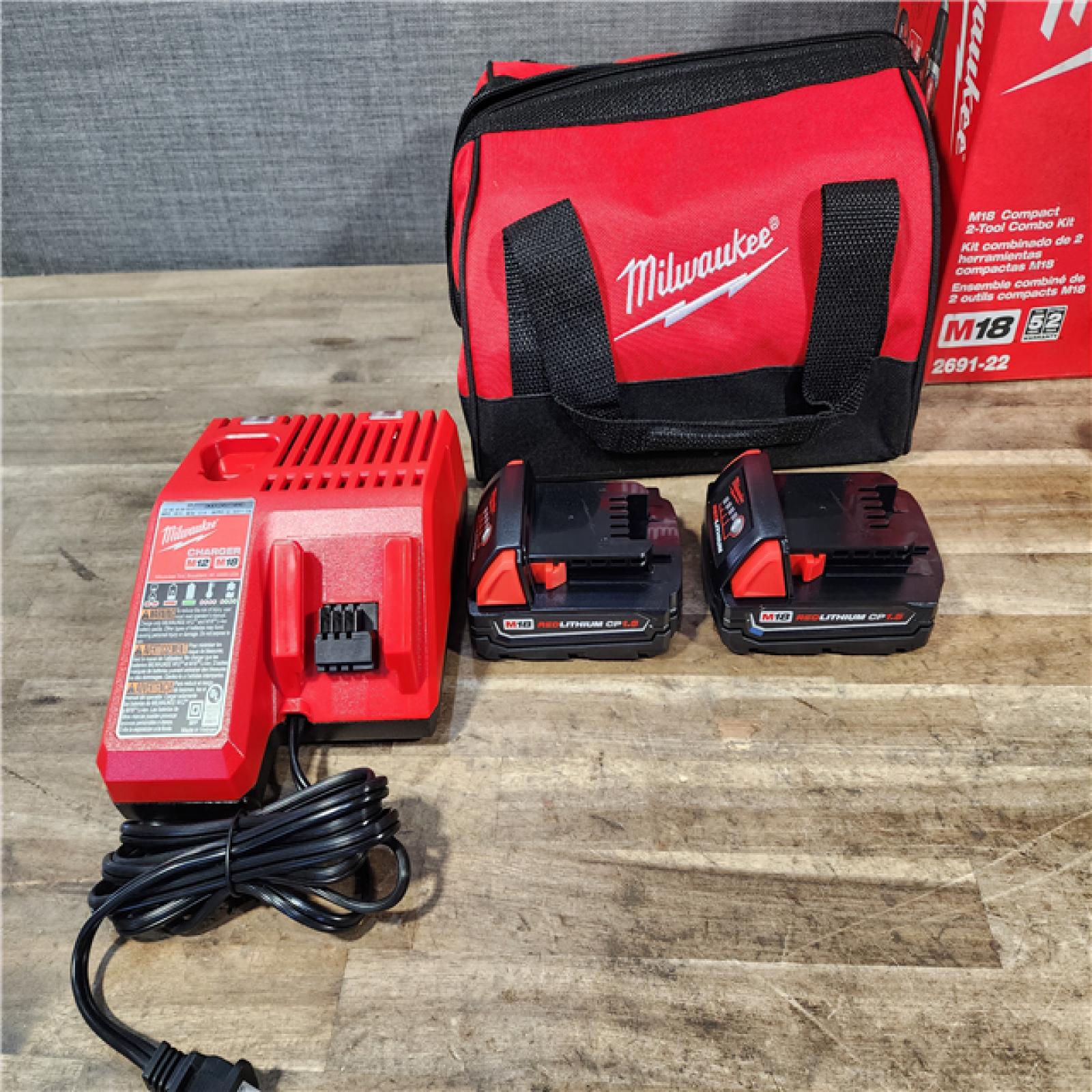 HOUSTON LOCATION - AS-IS Milwaukee 18V Lithium-Ion Cordless Drill Driver/Impact Driver Combo Kit