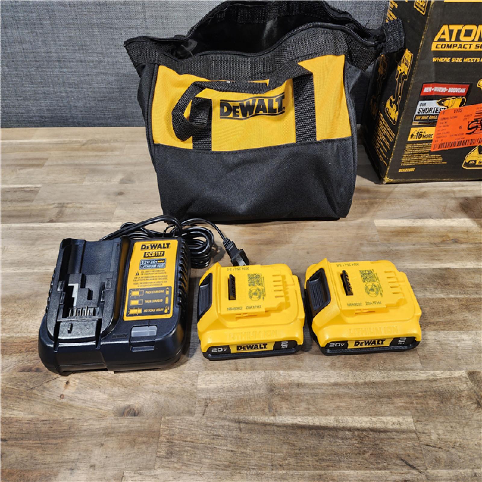 HOUSTON LOCATION - AS-IS Dewalt DCK225D2 20V MAX ATOMIC Brushless Compact Lithium-Ion 1/2 in. Cordless Drill Driver and 1/4 in. Impact Driver Combo Kit with 2 Batteries 2 Ah