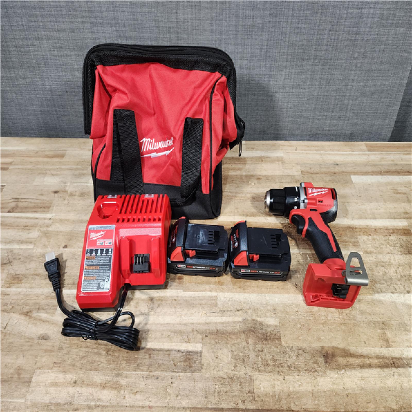 HOUSTON LOCATION - AS - IS Milwaukee 18V Lithium-Ion Brushless Cordless 1/2 in. Compact Drill/Driver Kit