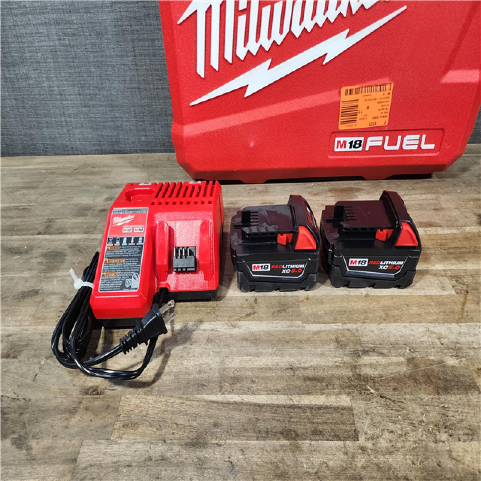 HOUSTON LOCATION - AS-IS MILWAUKEE FUEL 18V Lithium-Ion Brushless Cordless Hammer Drill and Impact Driver Combo Kit