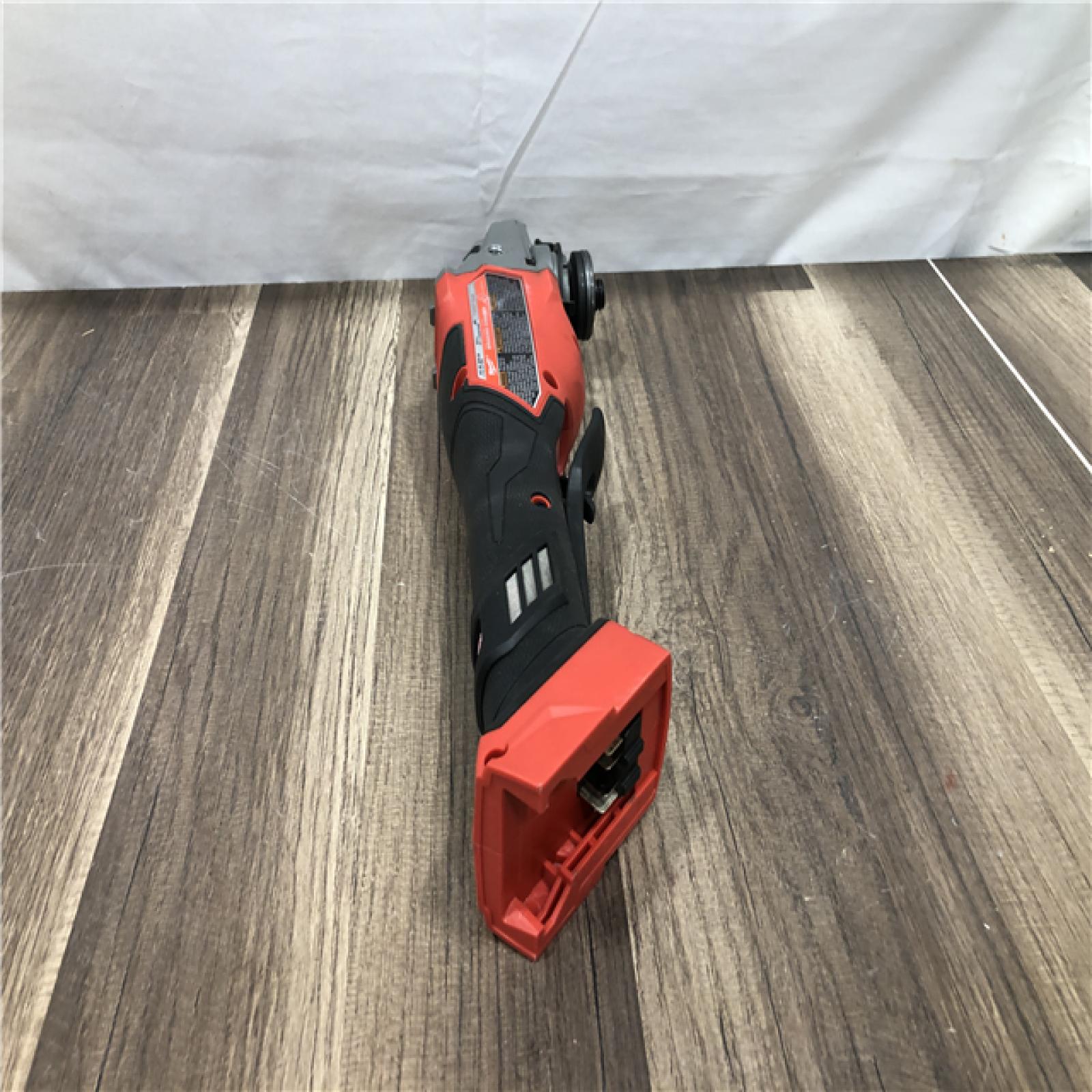 AS-IS Milwaukee  FUEL 18-Volt Lithium-Ion Brushless Cordless 4-1/2 in./6 in. Braking Grinder with Paddle Switch (Tool-Only)