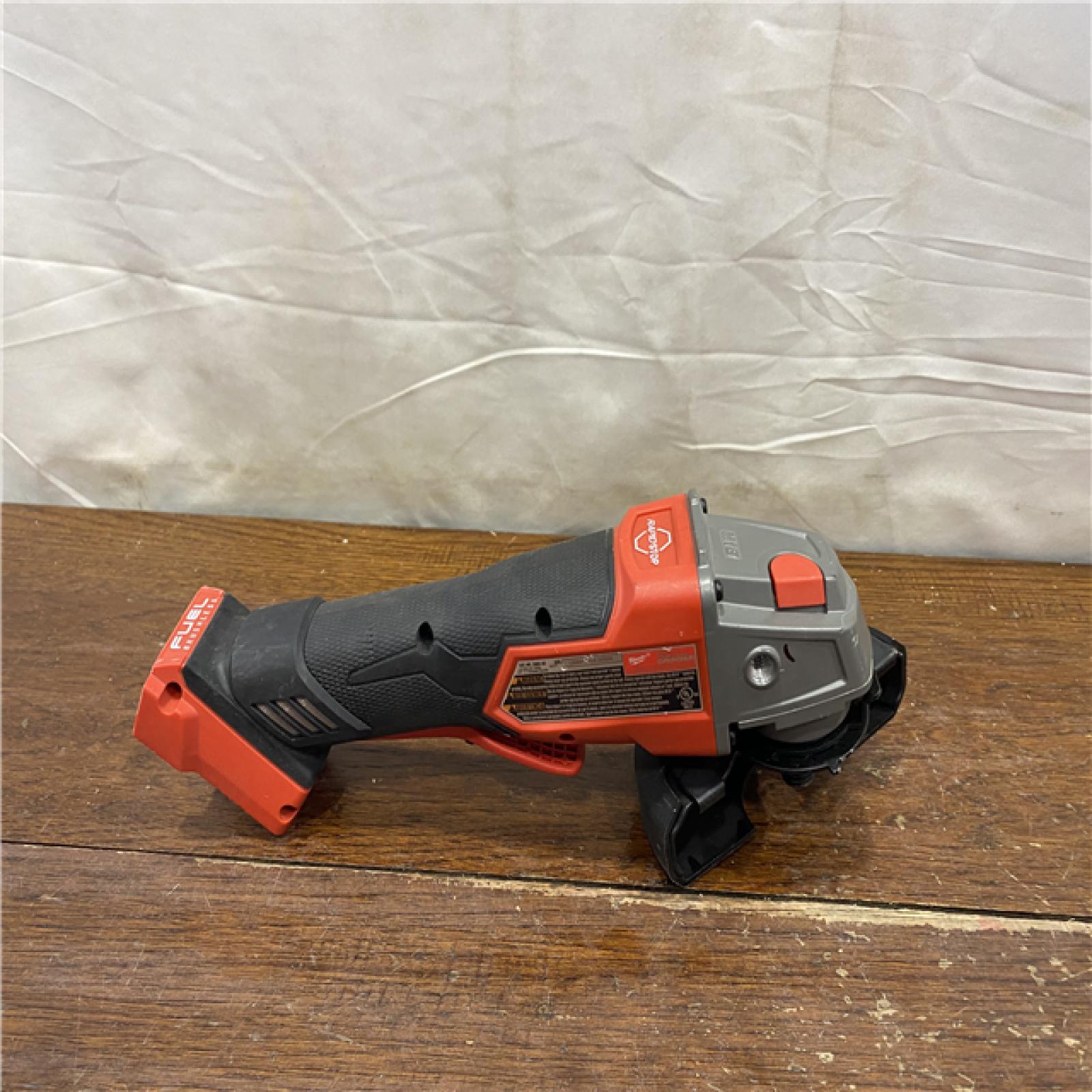 AS-IS Milwaukee 2880-20 M18 FUEL 18-Volt Lithium-Ion Brushless Cordless 4-1/2 in./5 in. Grinder W/Paddle Switch (Tool-Only)