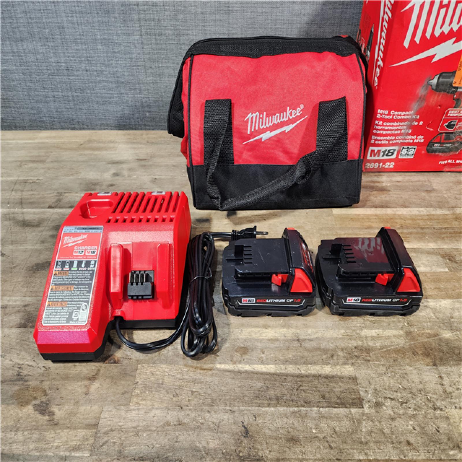 HOUSTON LOCATION - AS-IS Milwaukee 18V Cordless Brushed 2-Tool Drill/Driver and Impact Driver Kit