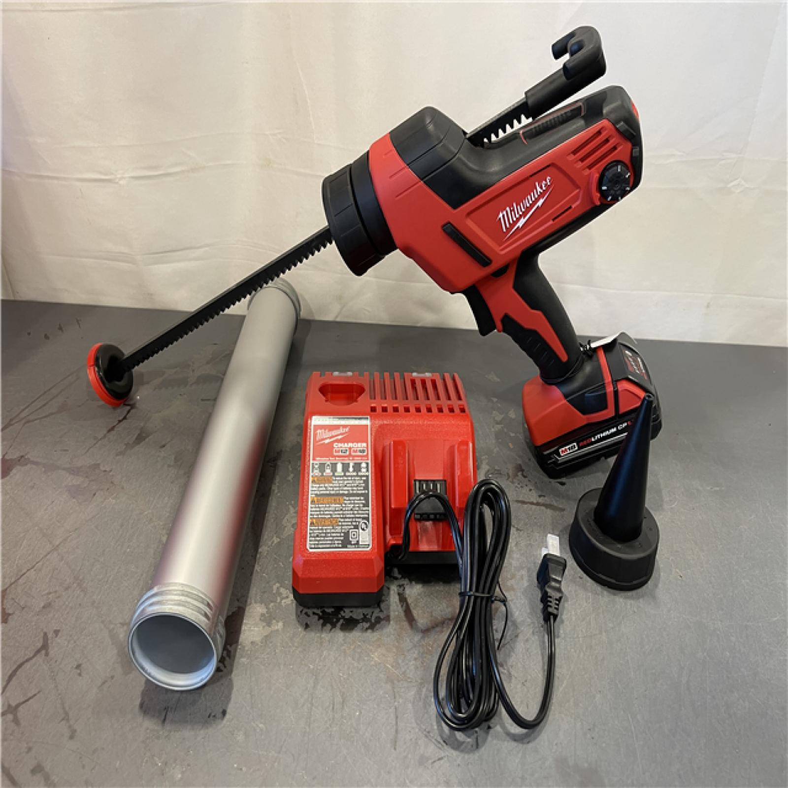 AS-IS - Milwaukee M18 18V Lithium-Ion Cordless 20 Oz. Caulk and Adhesive Gun Kit