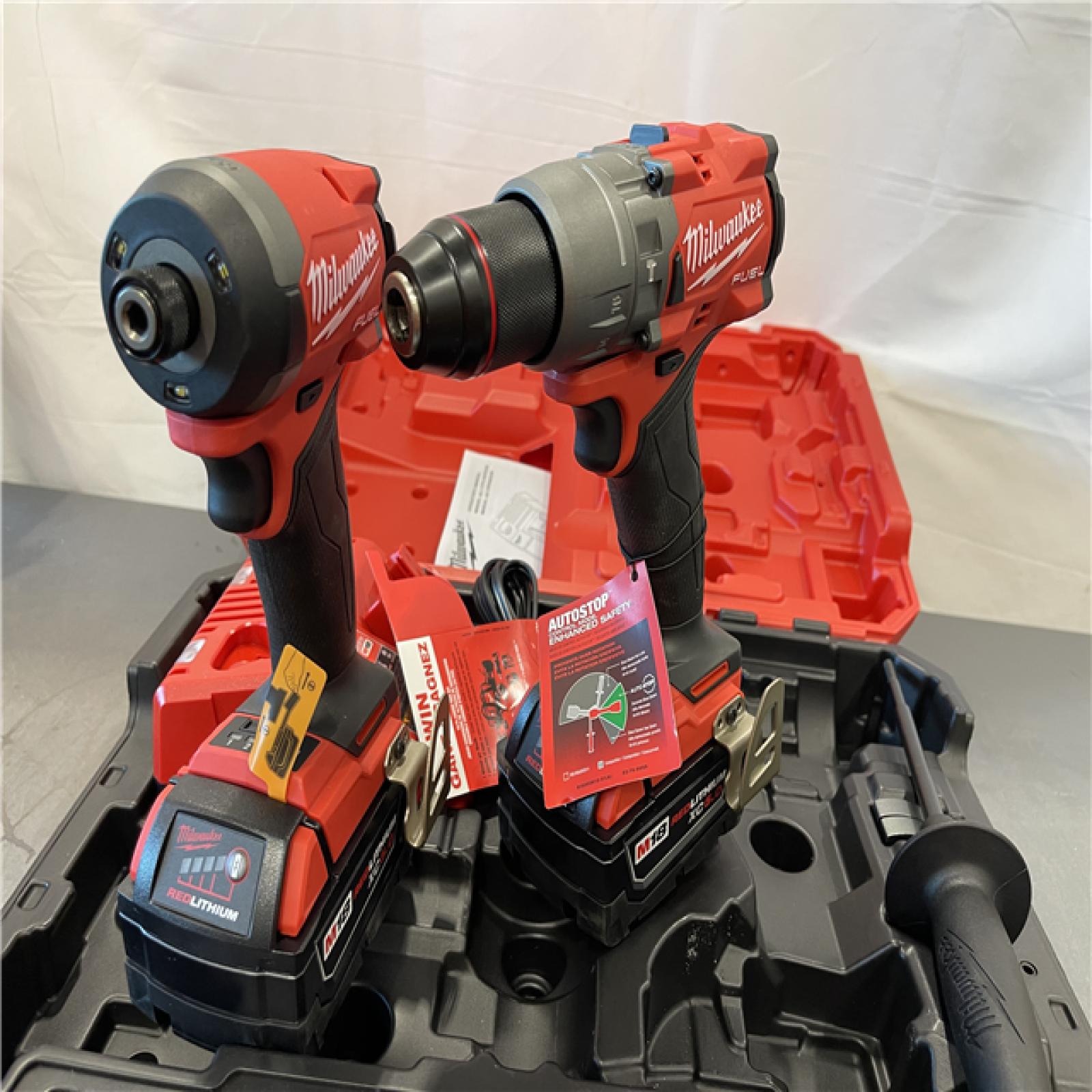 AS-IS - Milwaukee M18 FUEL 18V Lithium-Ion Brushless Cordless Hammer Drill and Impact Driver Combo Kit