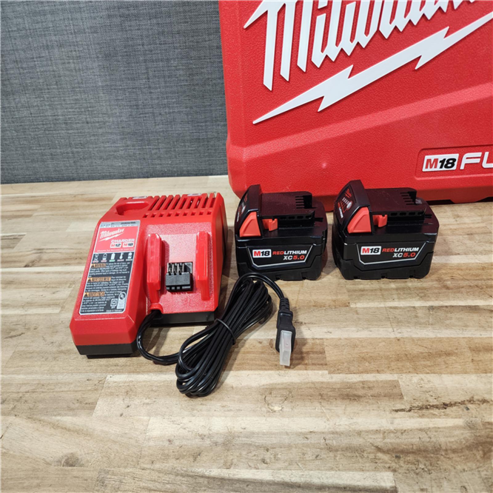 HOUSTON LOCATION - AS-IS (APPEARS LIKE NEW) Milwaukee FUEL 18V Lithium-Ion Brushless Cordless Hammer Drill and Impact Driver Combo Kit