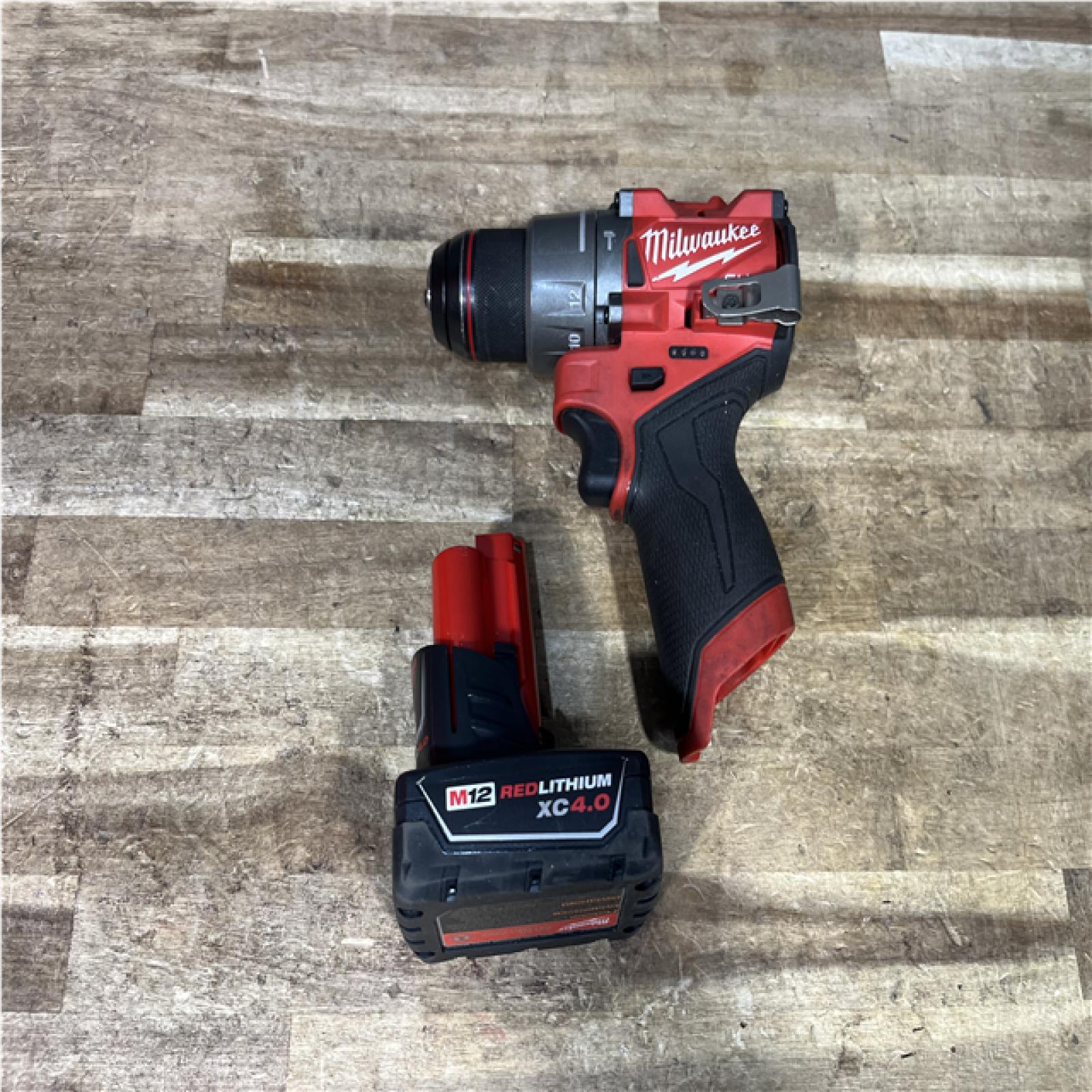 Houston Location AS-IS Milwaukee FUEL Hammer Drill Driver and Battery